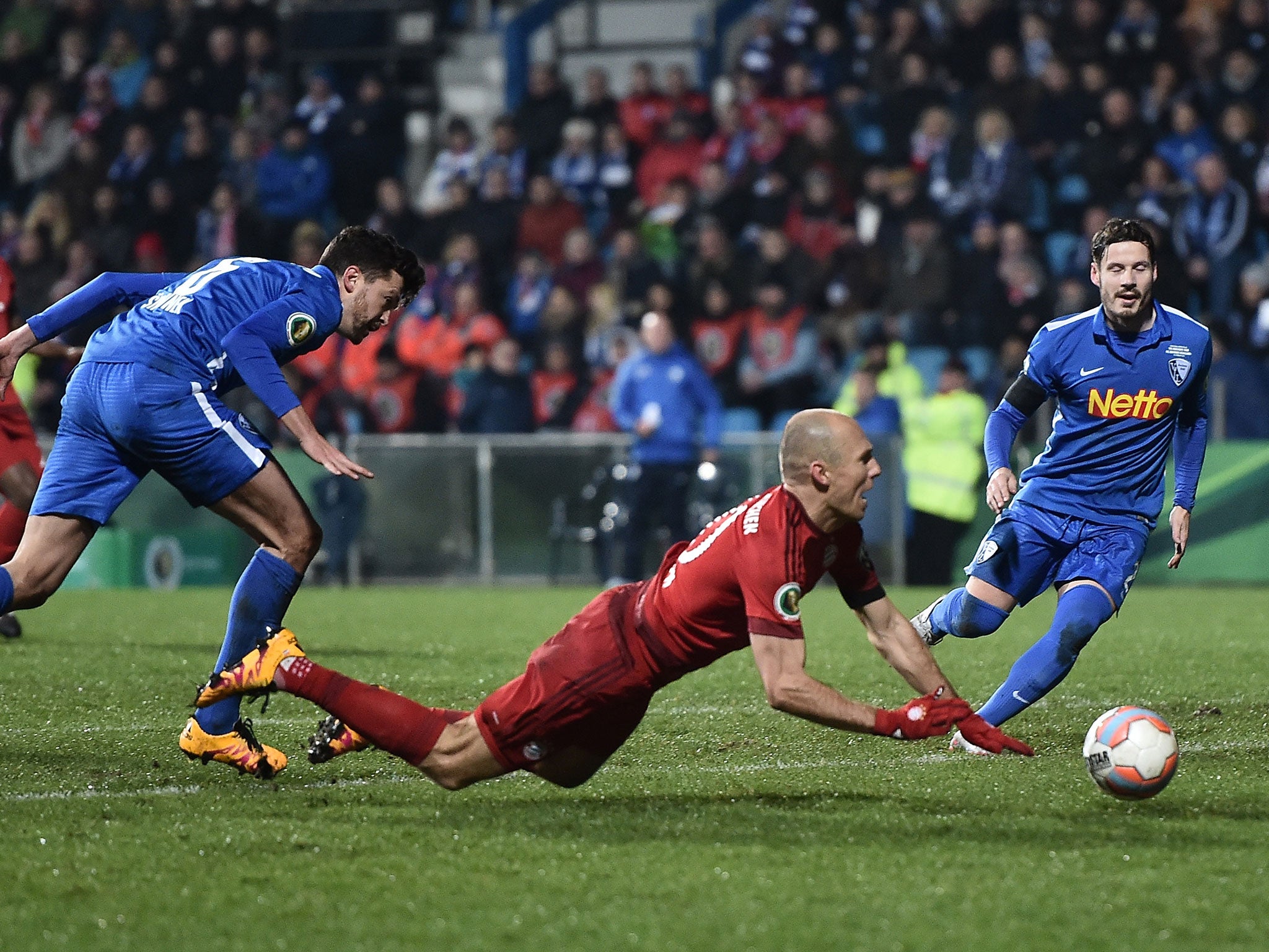 Arjen Robben goes to ground