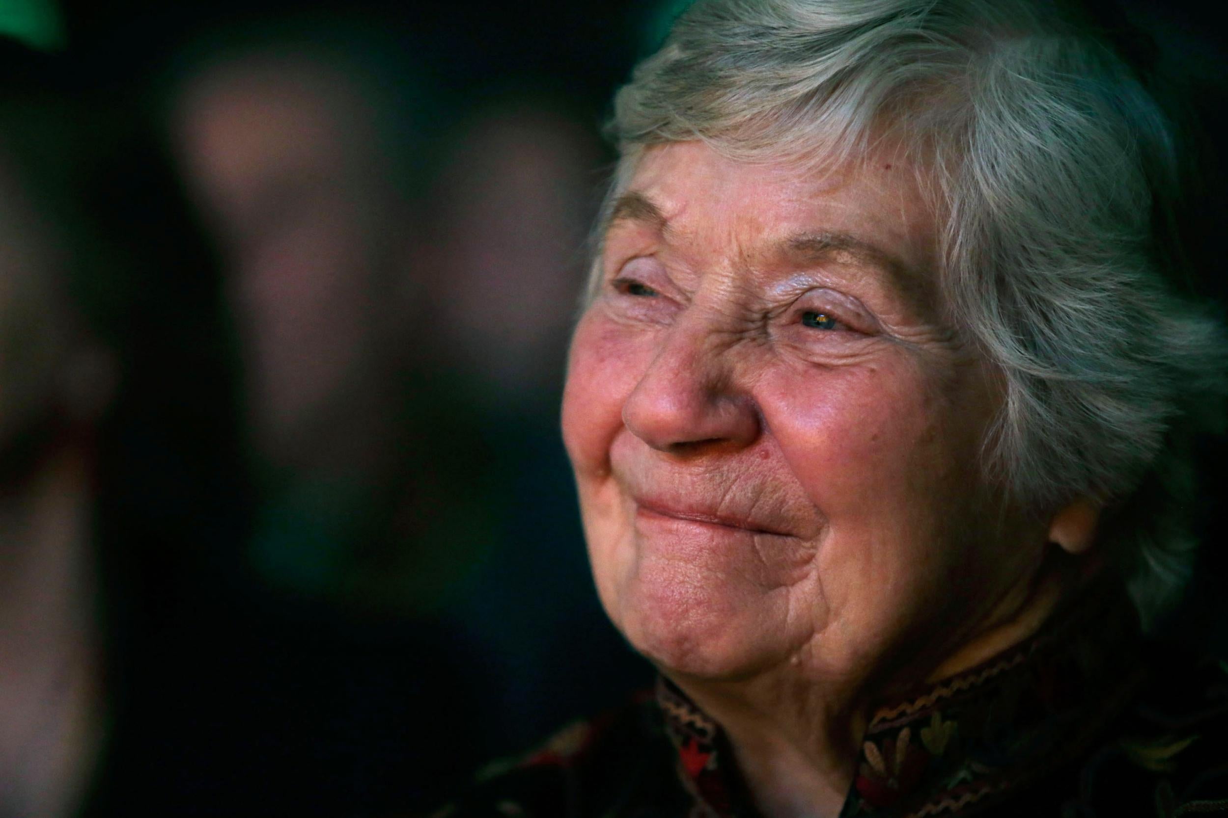 Dame Shirley Williams listens to a speech during the opening day of the Liberal Democrat spring party conference on March 8, 2013