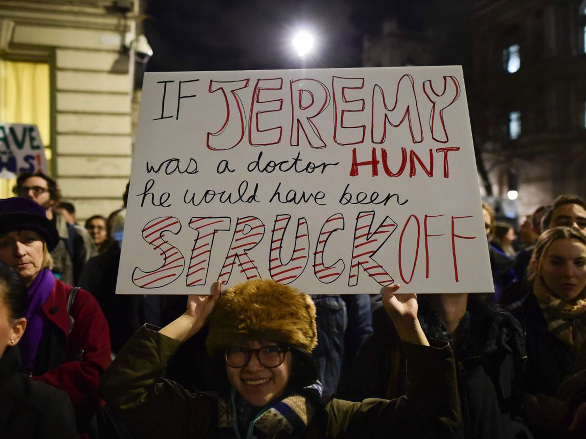 Junior doctors protesting outside the Department of Health in central London following the announcement of the government decision to impose new contracts