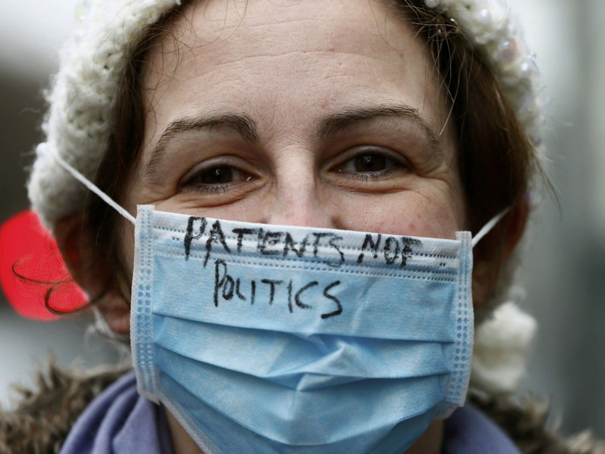 A junior doctor on strike outside University College Hospital, London, on Wednesday. Stefan Wermuth