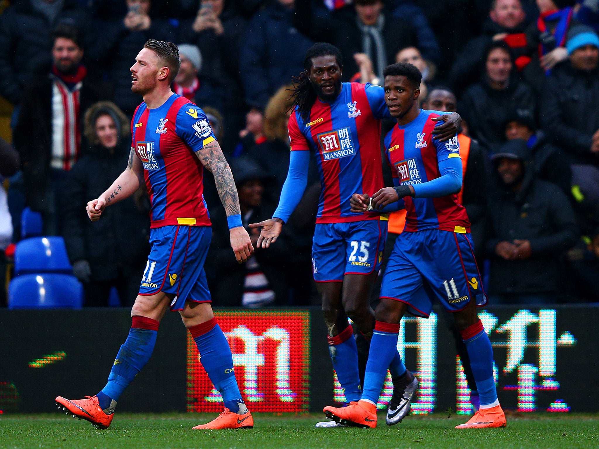 Emmanuel Adebayor celebrates scoring an equaliser for Crystal Palace against Watford