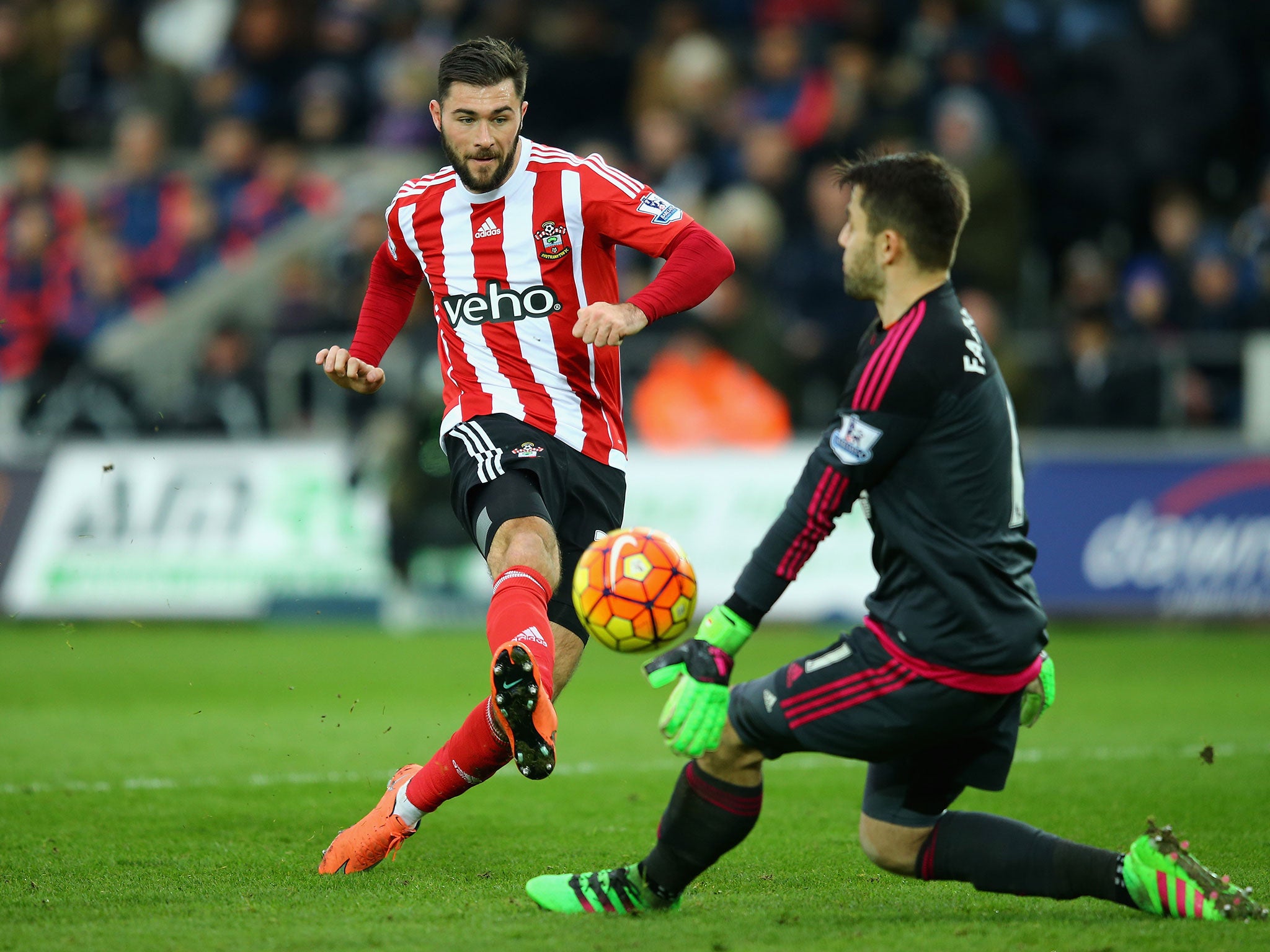 Charlie Austin's shot on goal is denied