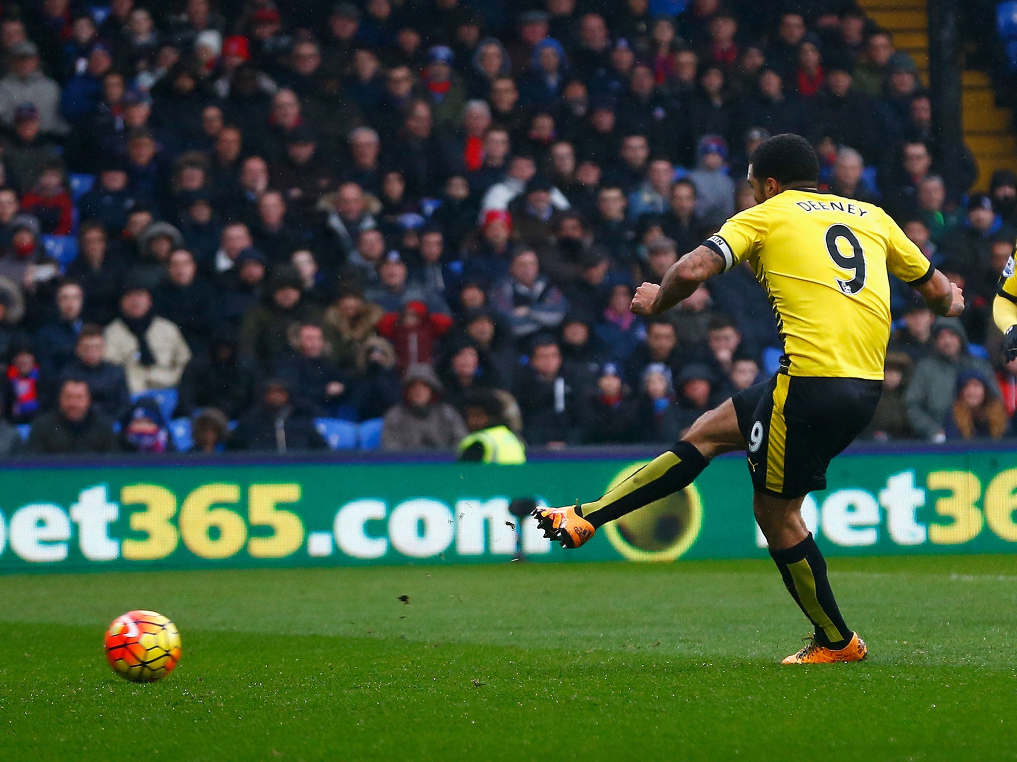 Troy Deeney scores from the penalty spot