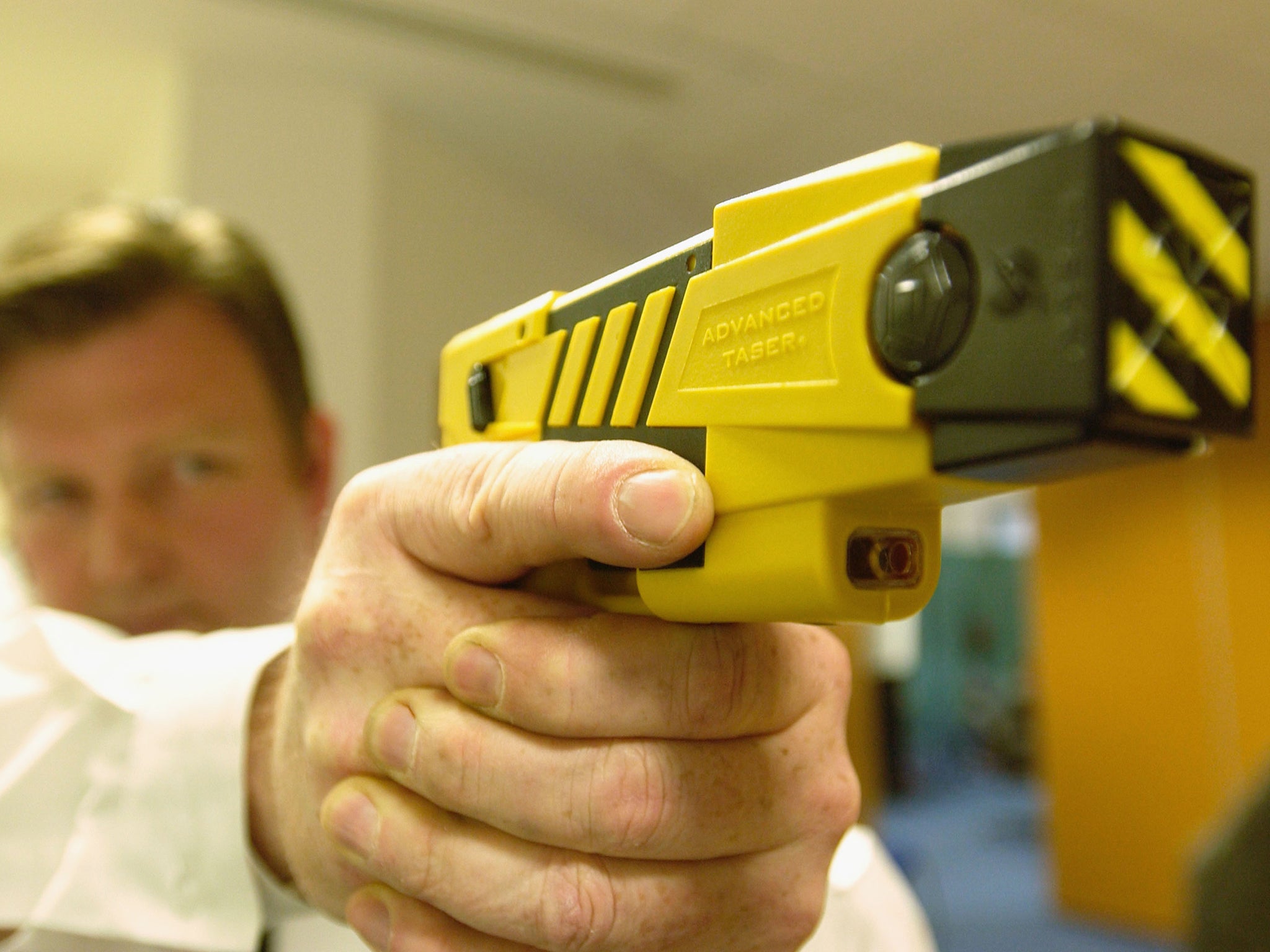 Tasers fire two darts, and temporarily disable their targets with a five-second discharge of 50,000 volts