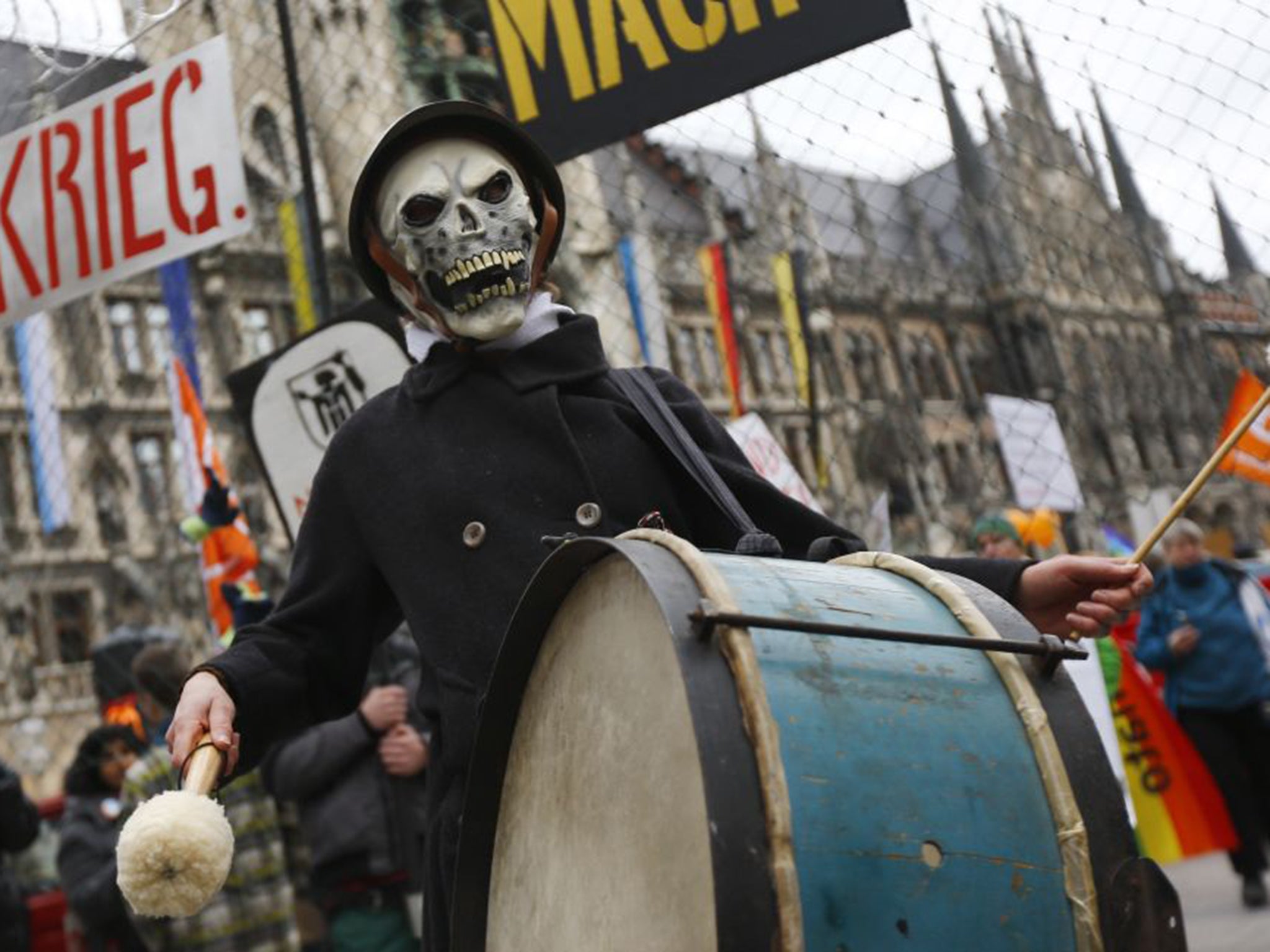 A protester outside the Munich talks