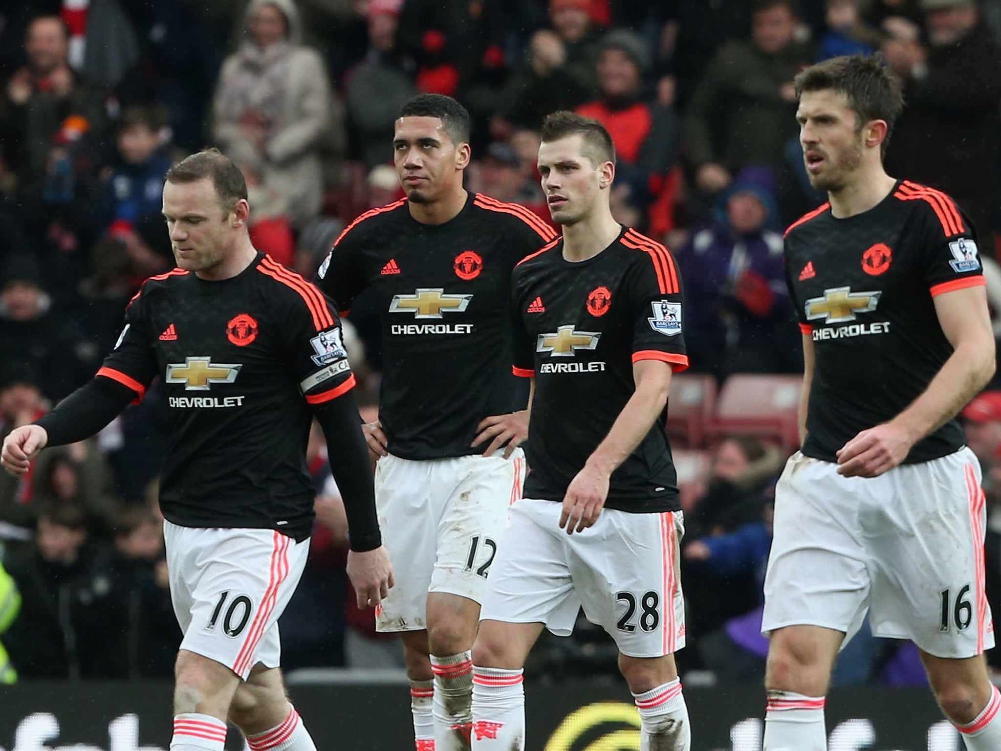 Wayne Rooney and his Manchester United team-mates