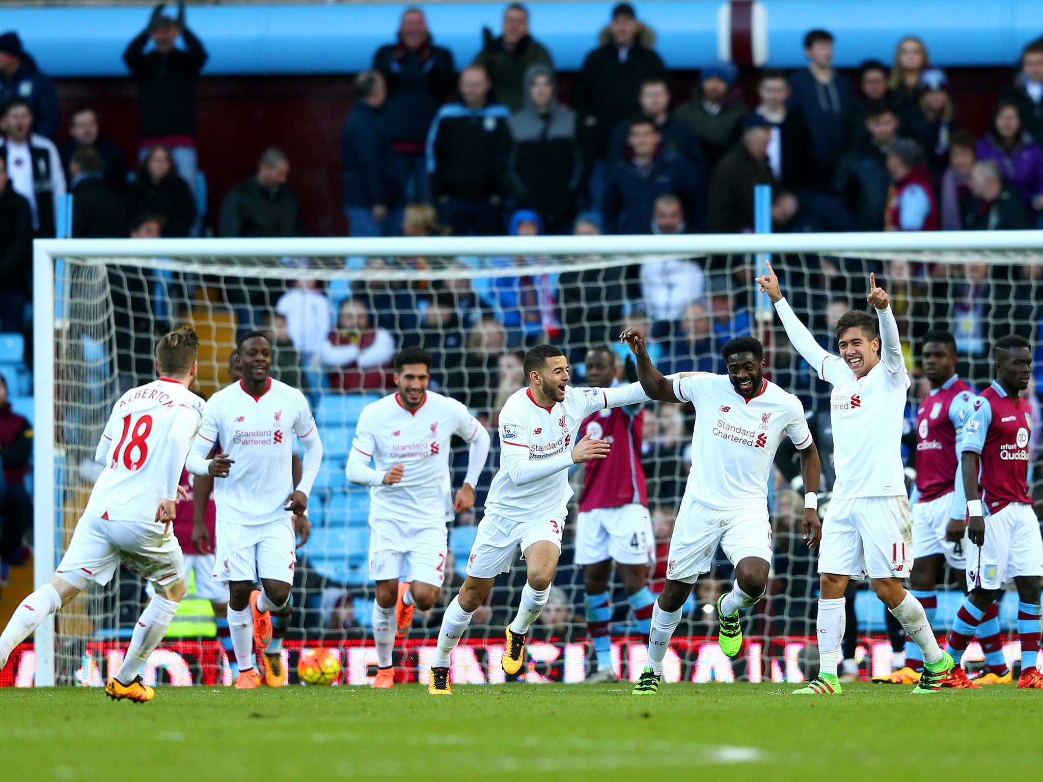 Kolo Toure enjoys the moment after scoring Liverpool's sixth goal