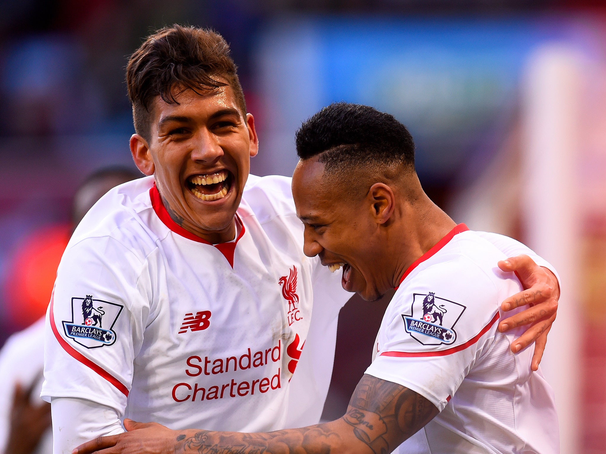 Liverpool's Roberto Firmino congratulates Nathaniel Clyne on his goal