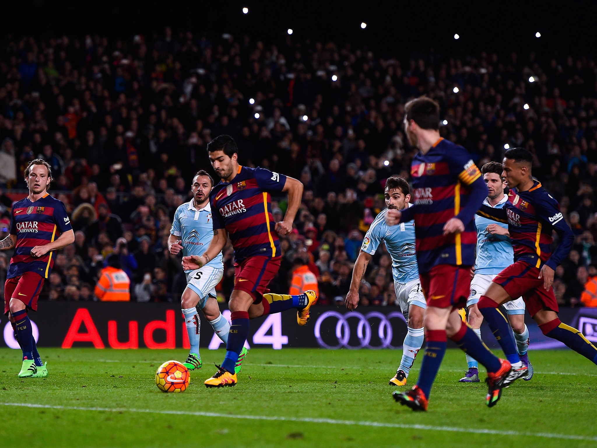 ...Luis Suarez runs into the penalty area to shoot at goal