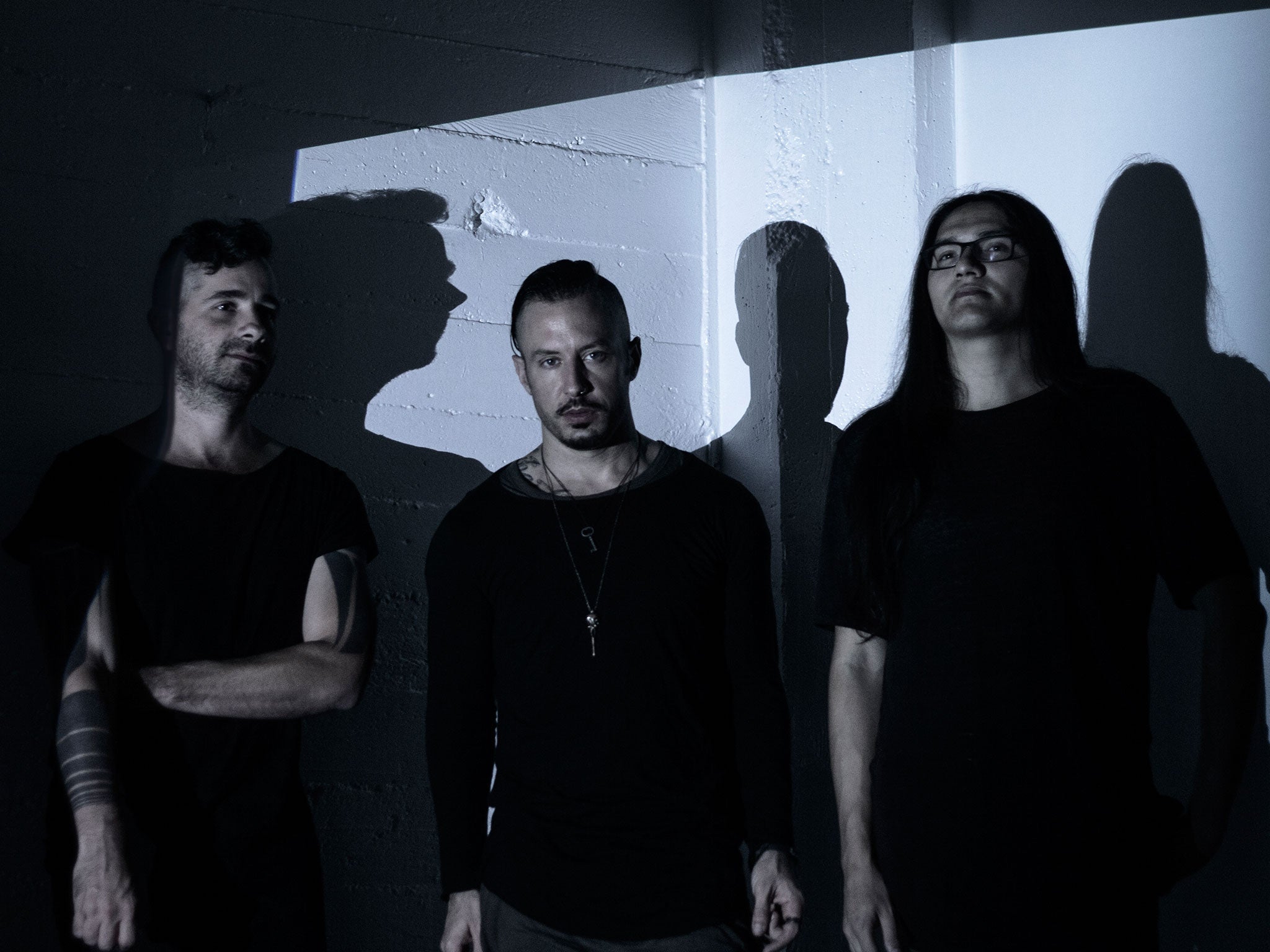 The Black Queen, from left to right, Joshua Eustis, Greg Puciato and Steven Alexander