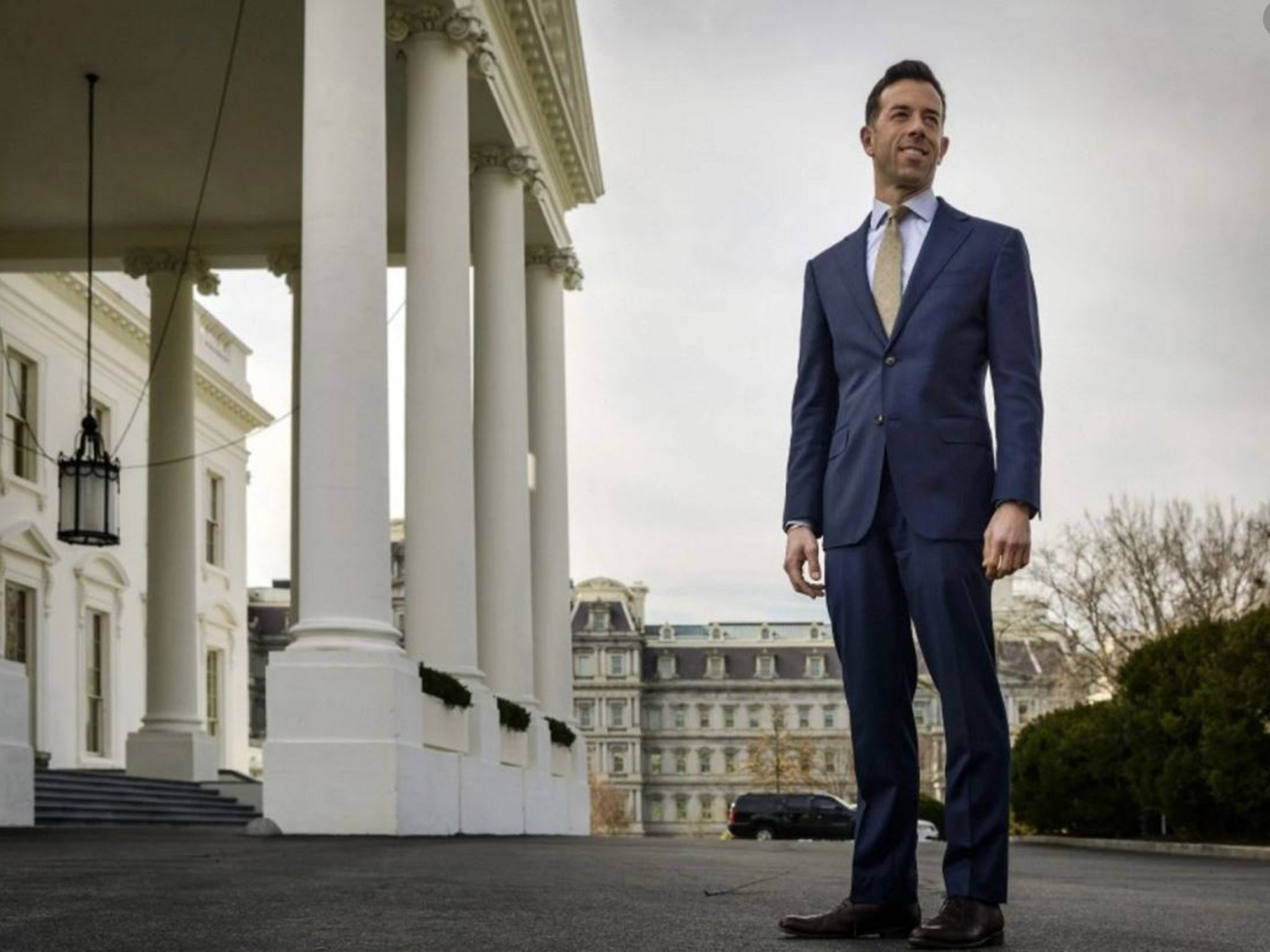 Brian Mosteller, a special assistant to President Obama and director of Oval Office operations, in front of the White House