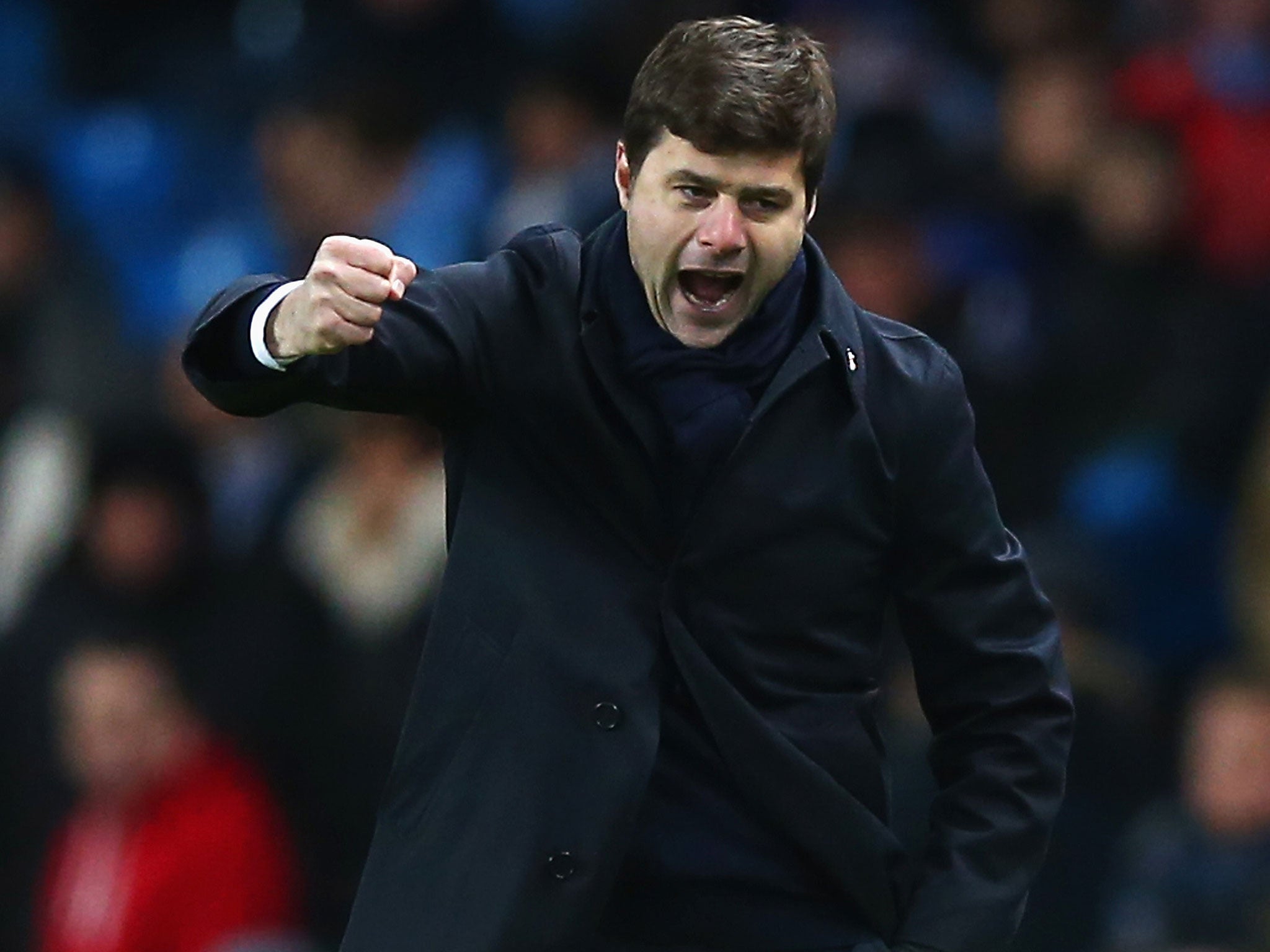 Mauricio Pochettino celebrates the 2-1 victory over Manchester City