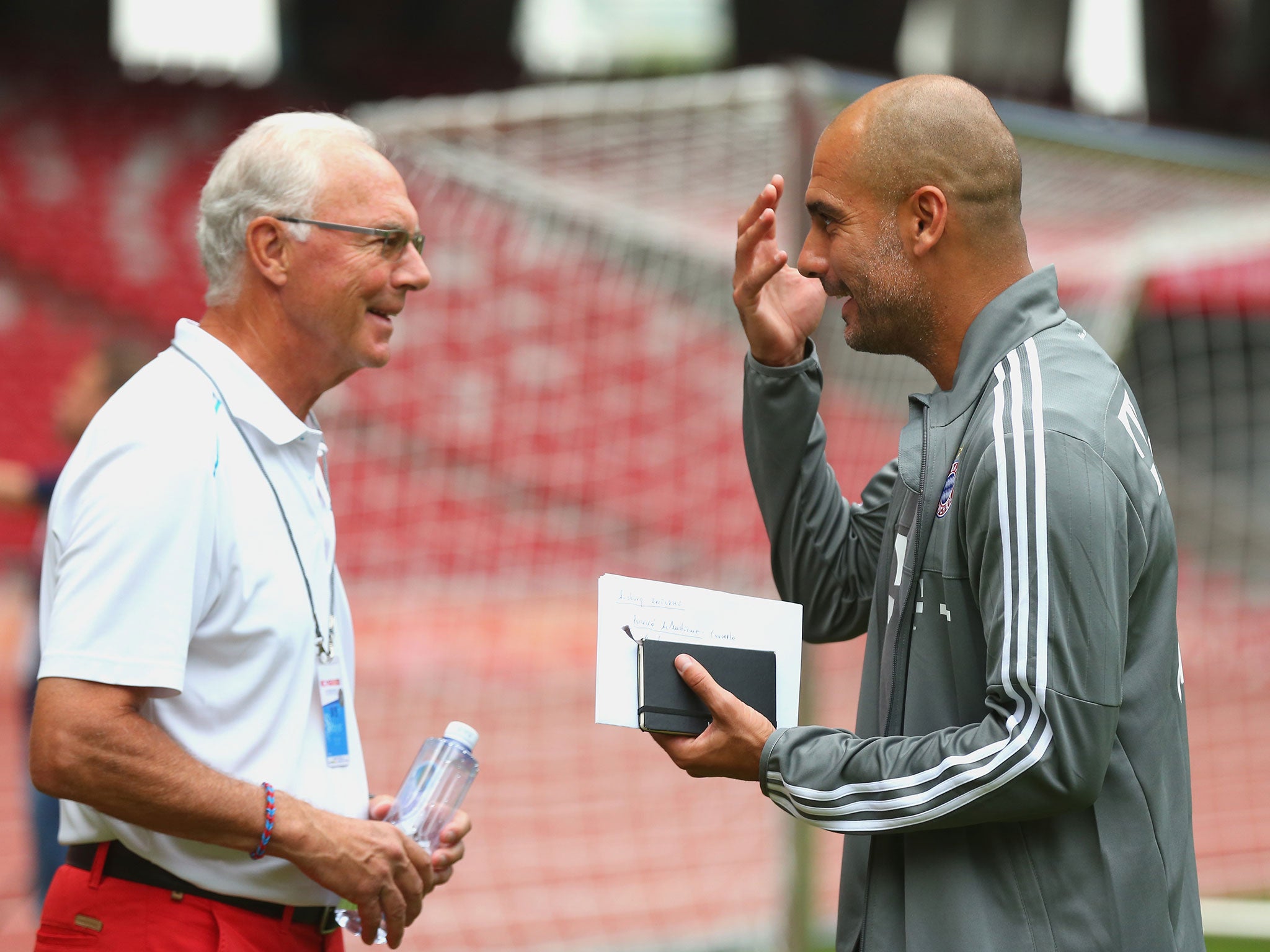 Franz Beckenbauer (left) alongside Pep Guardiola