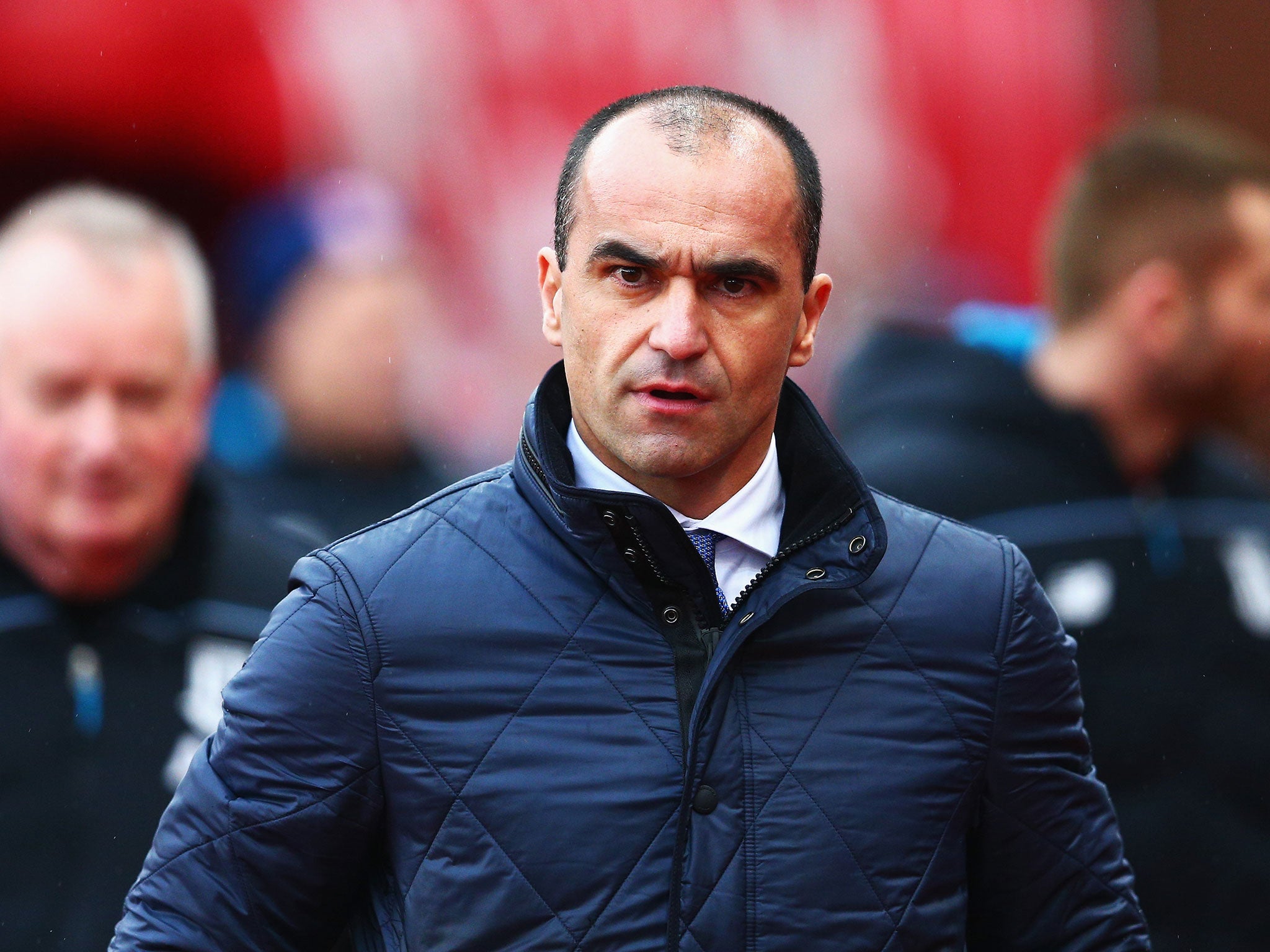 Everton manager Roberto Martinez has played down suggestions the club need to win the FA Cup this season