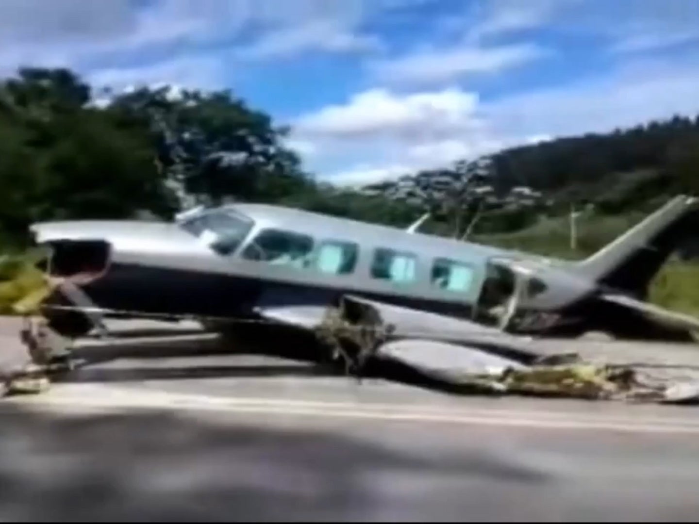 Video has emerged showing the dramatic moment when a plane is forced to make an emergency landing on a road in Brazil.