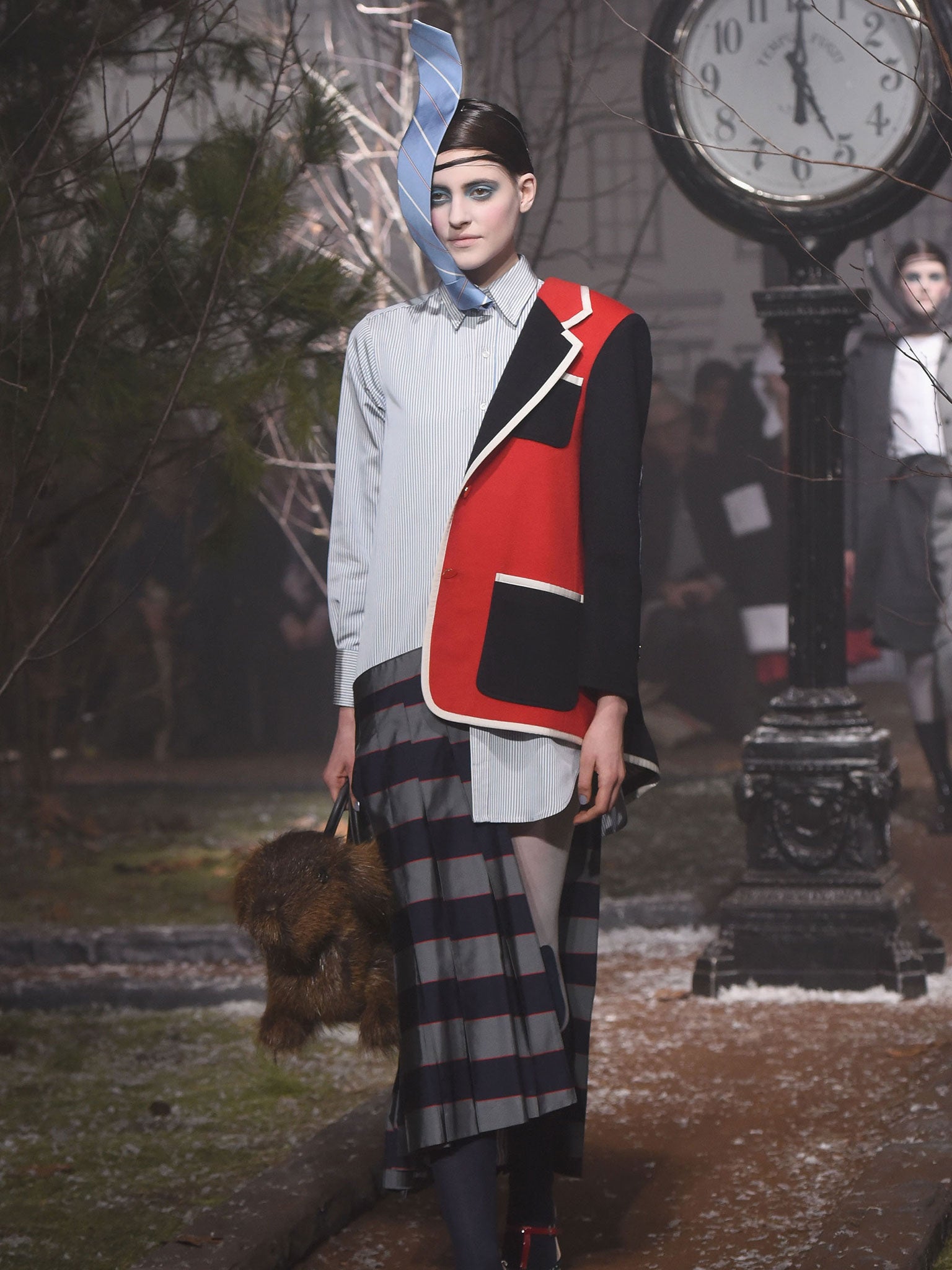 Thom Browne featured topsy-turvy, misbuttoned and displaced tailoring like an MGM fashion show in a twister