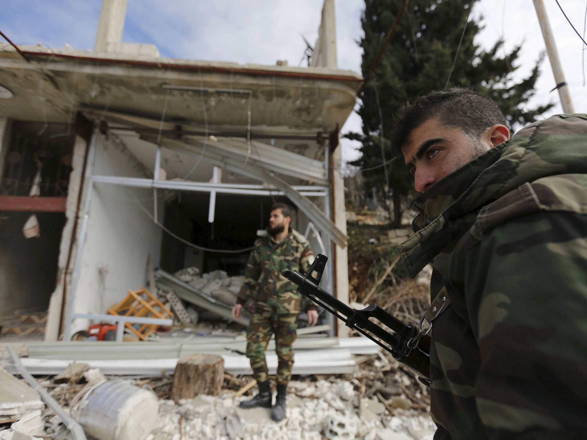 Government troops in bombed-out al-Rabiaa