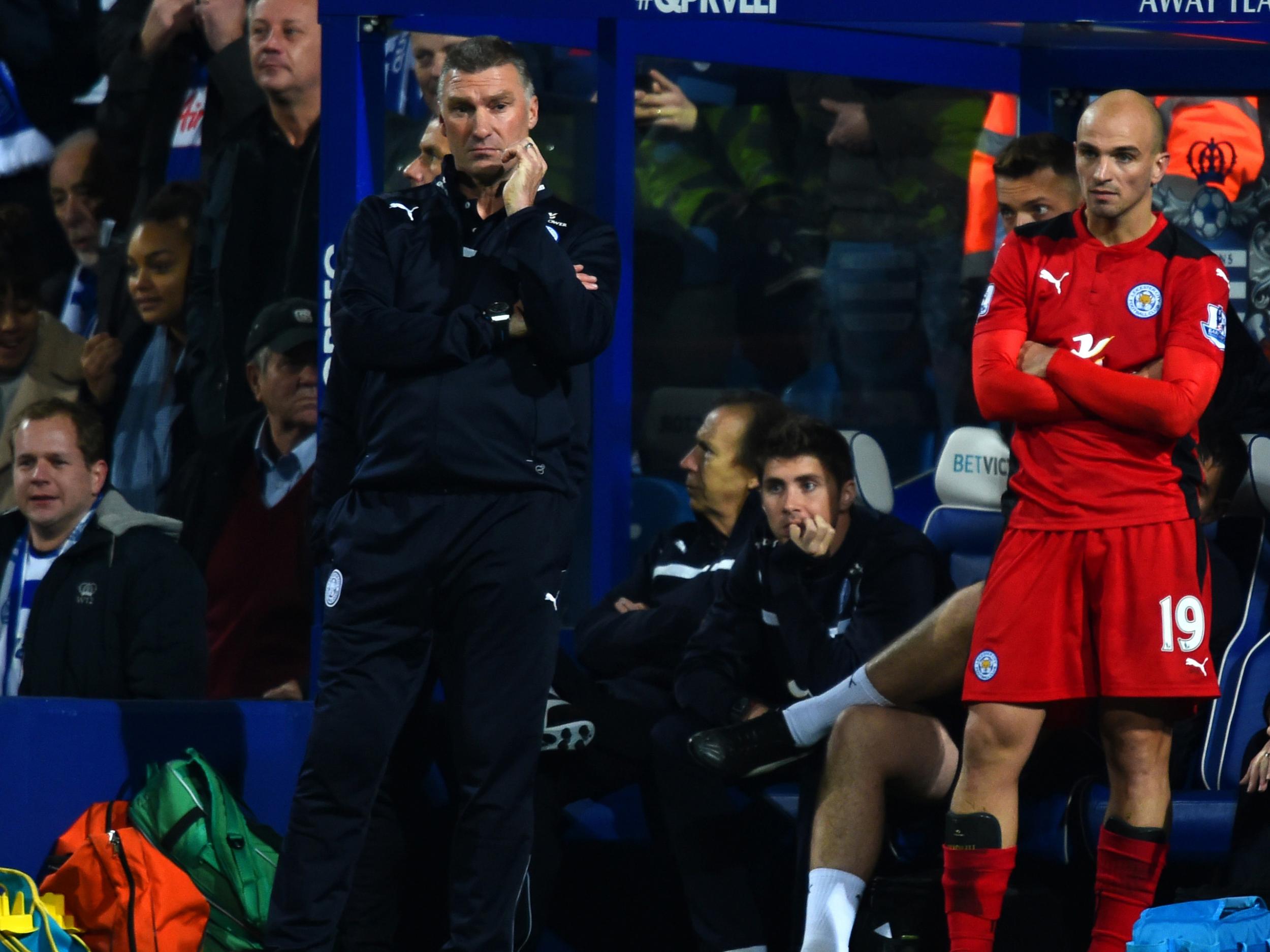 Nigel Pearson and Esteban Cambiasso on the sidelines during their spells at Leicester City