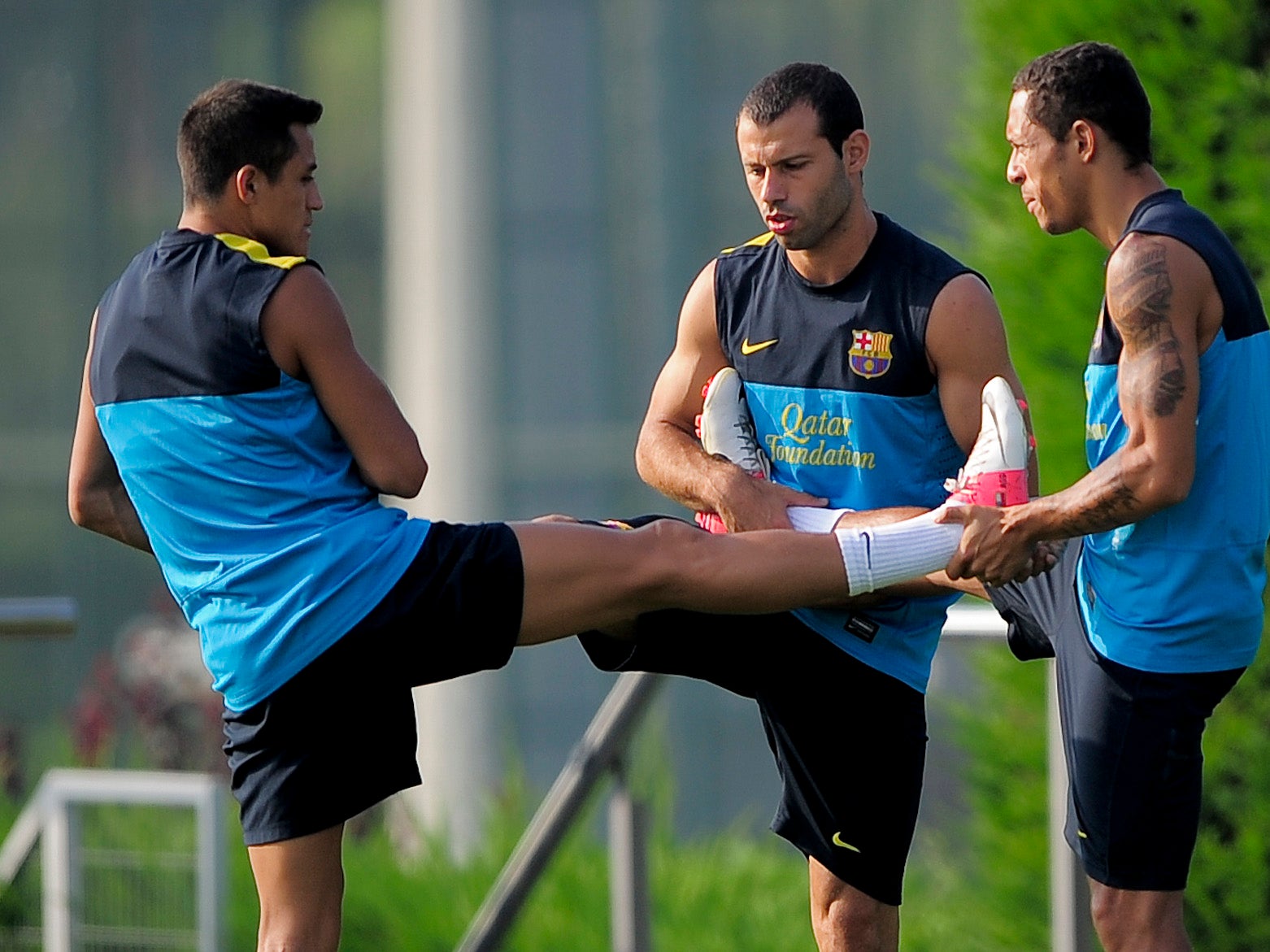 Alexis Sanchez and Javier Mascherano in Barcelona training