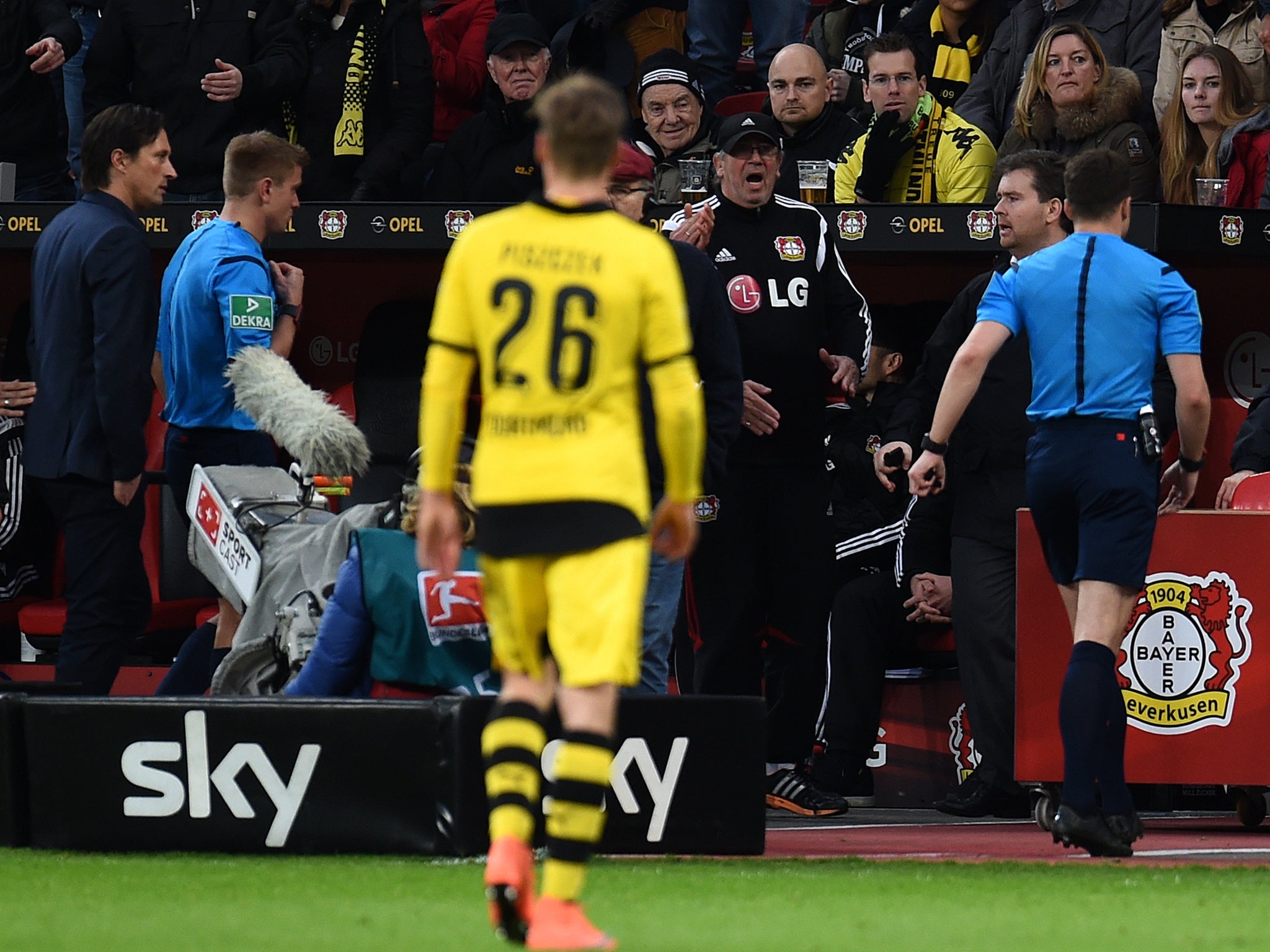 Referee Felix Zwayer walks off the field during the match