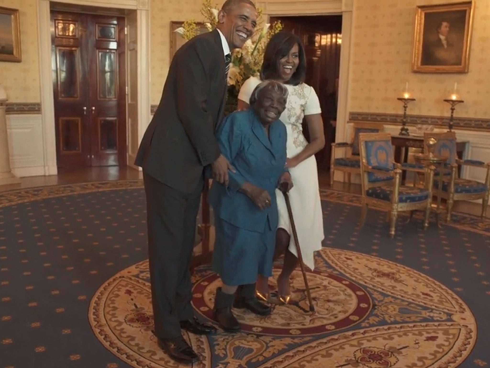 Screengrab taken from undated video footage posted on the Twitter feed of The White House of 106-year-old Virginia McLaurin dancing with President Barack Obama and First Lady Michelle Obama during a Black History Month event at the White House in Washington, DC.