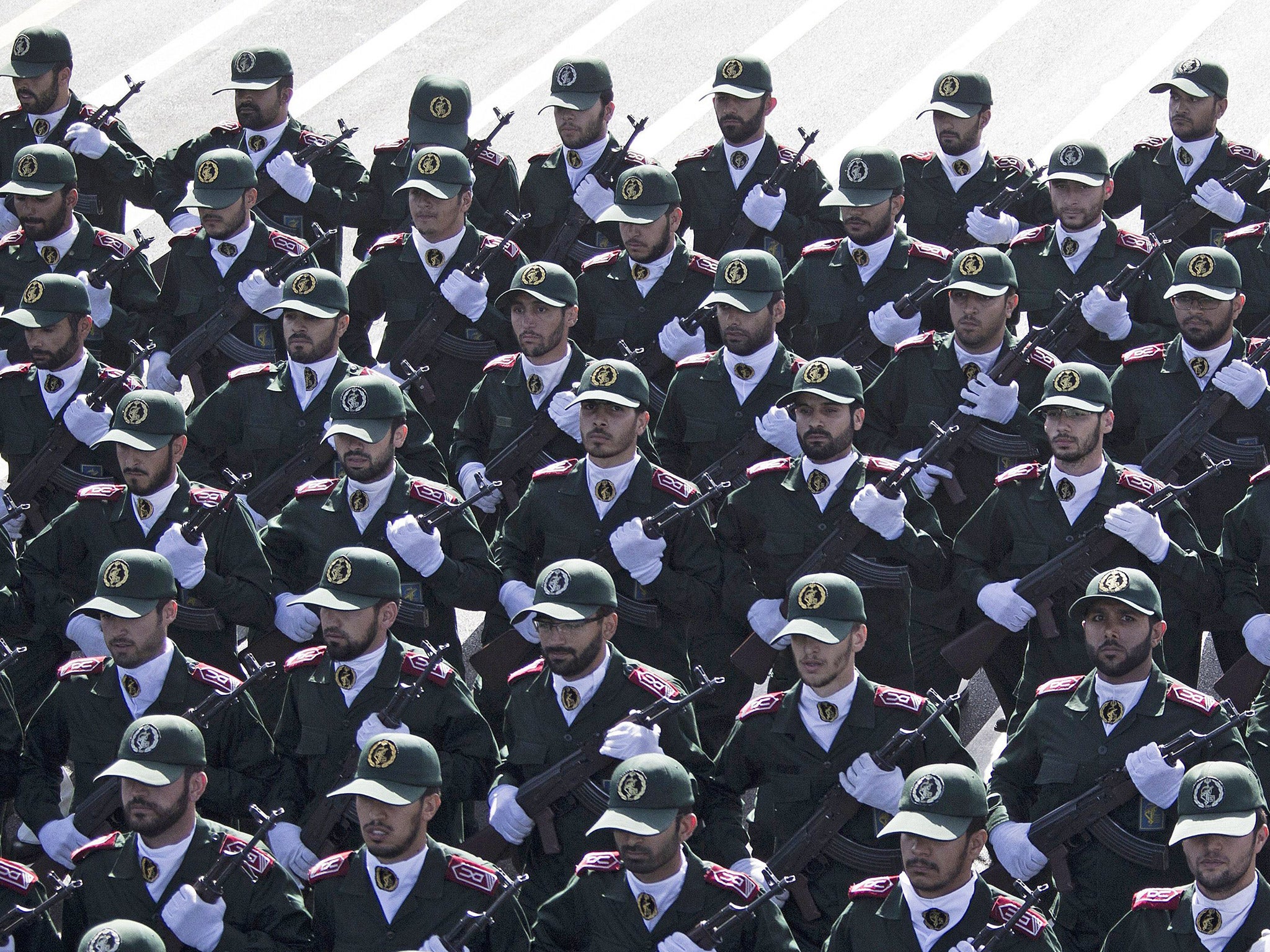 &#13;
Iranian soldiers from the Revolutionary Guards march during a military parade in Tehran (Getty)&#13;