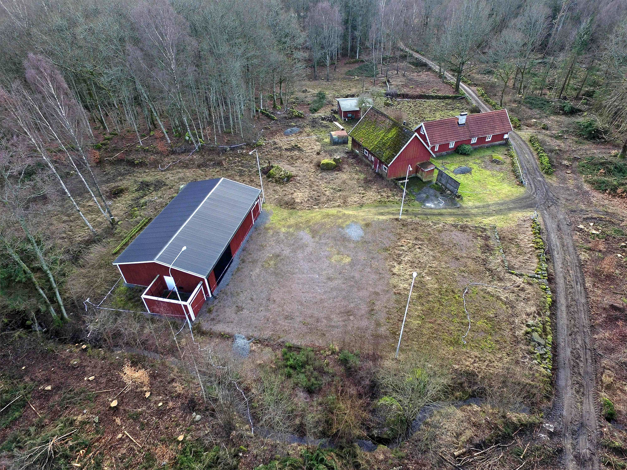 The bunker can be seen to the left of doctor Trenneborg's farm in Oestra Goeinge, north of Kristianstad, Sweden