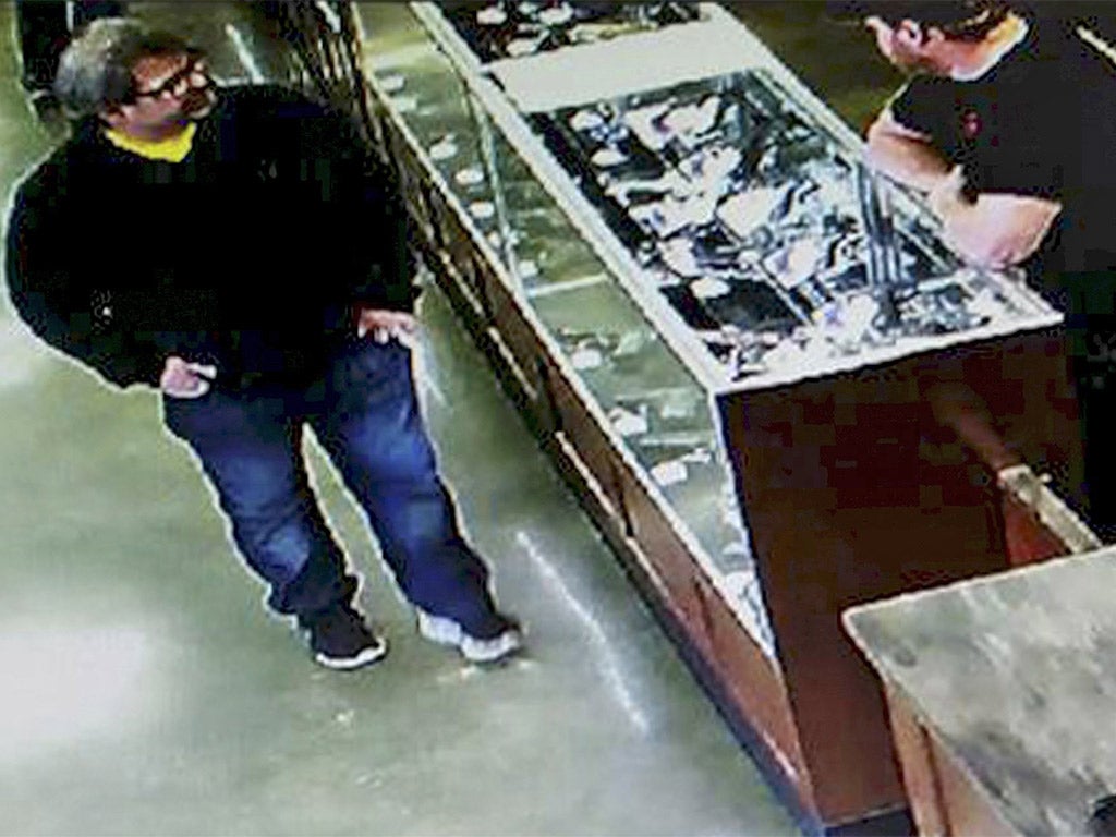 Jason Dalton is seen at Southwick's gun shop in Plainwell, Michigan