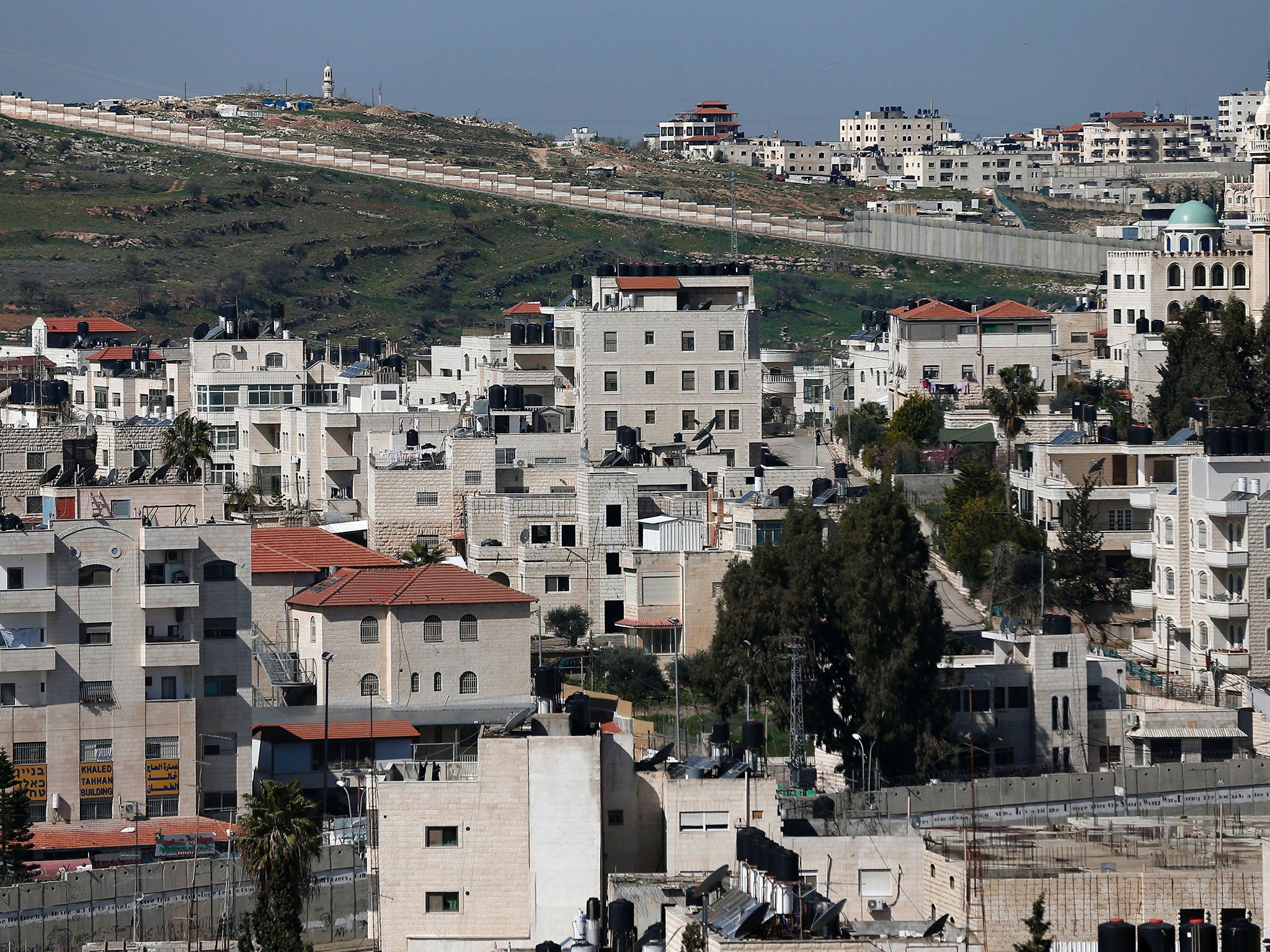 Run by convicted terrorist Ze'ev Hever, Amana builds illegal settlements in the West Bank