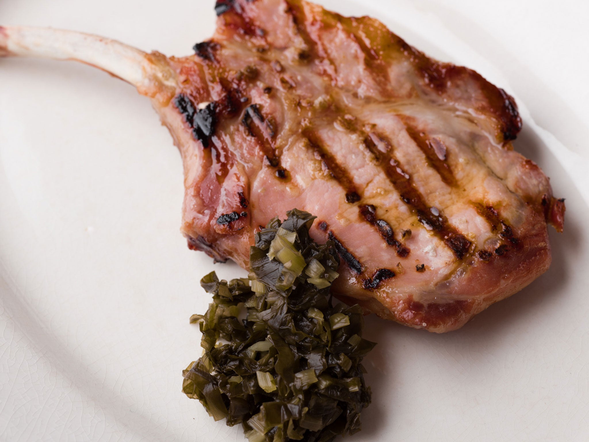 Bacon chop with wild garlic pickle