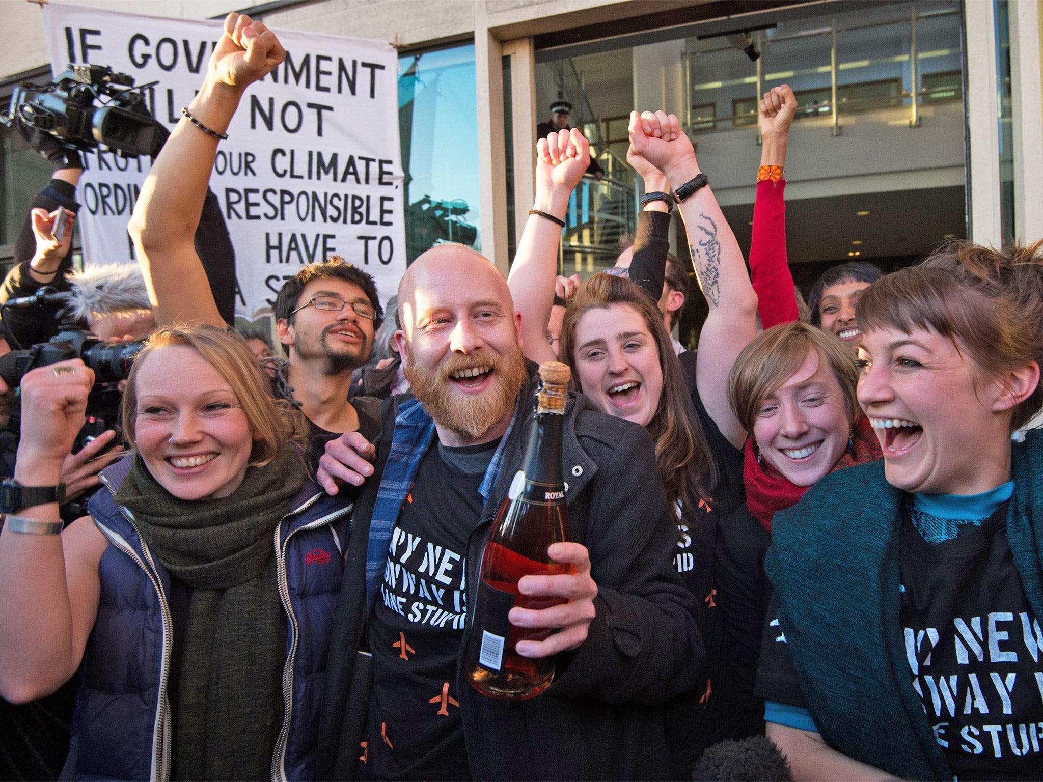 Some of the 13 climate change activists celebrate outside Willesden magistrates’ court