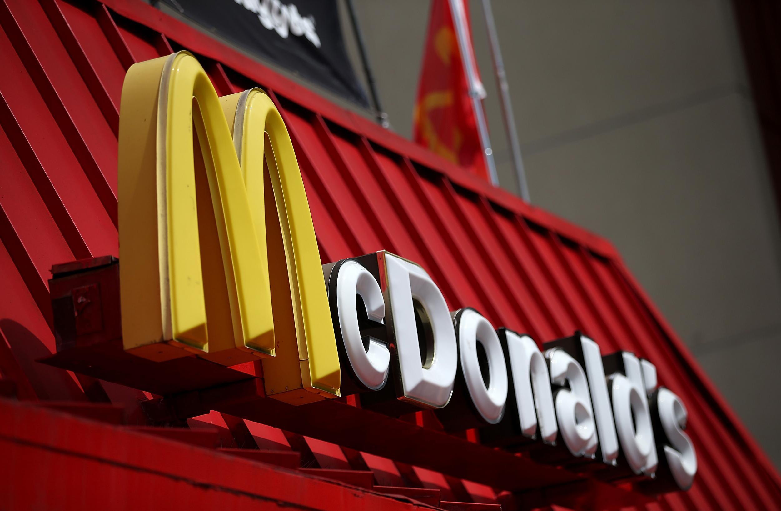 Staff from two McDonald's restaurants are staging a walkout