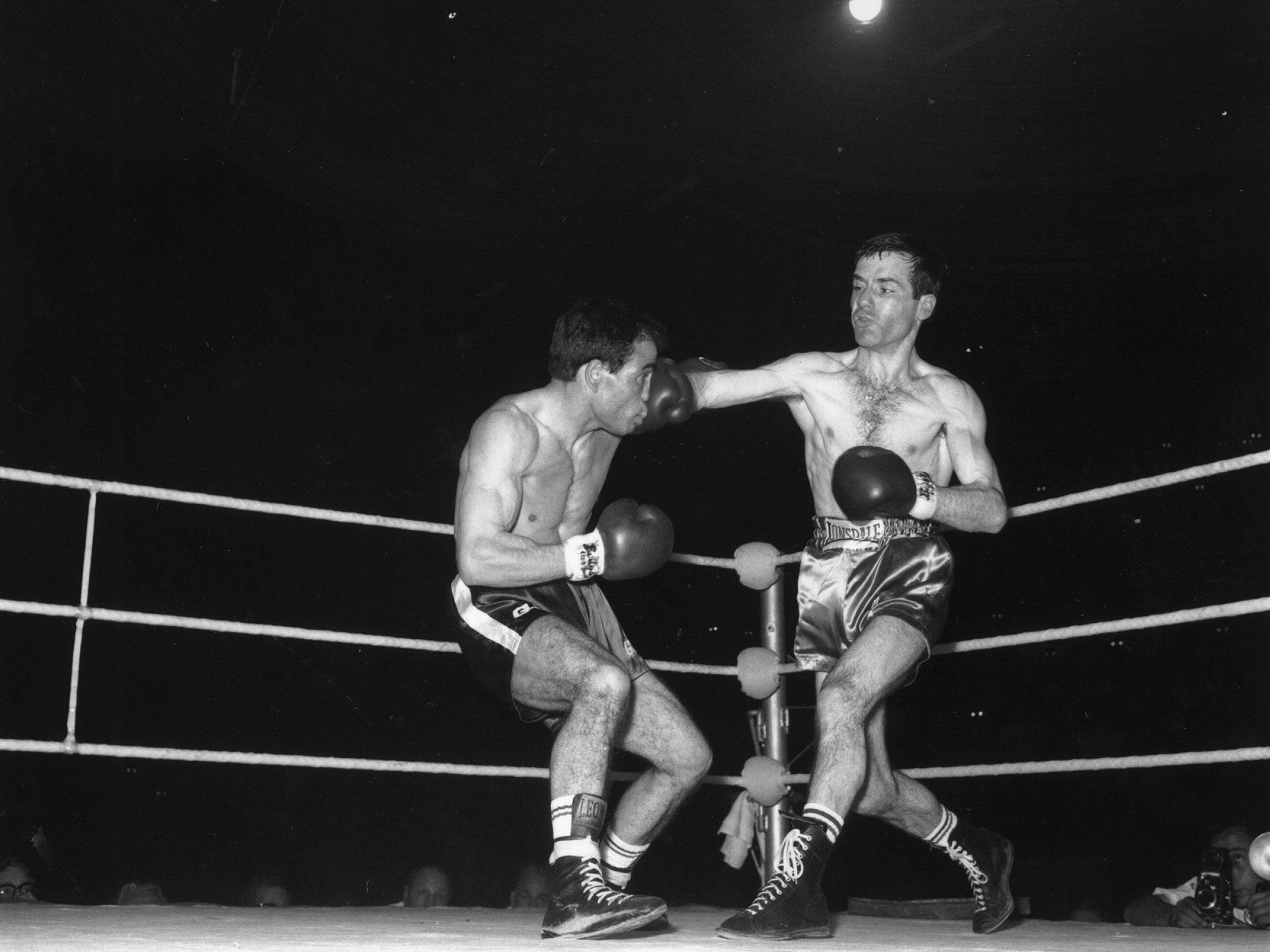 McGowan lands a blow on Salvatore Burruni at Wembley in 1966 on his way to taking the world flyweight title