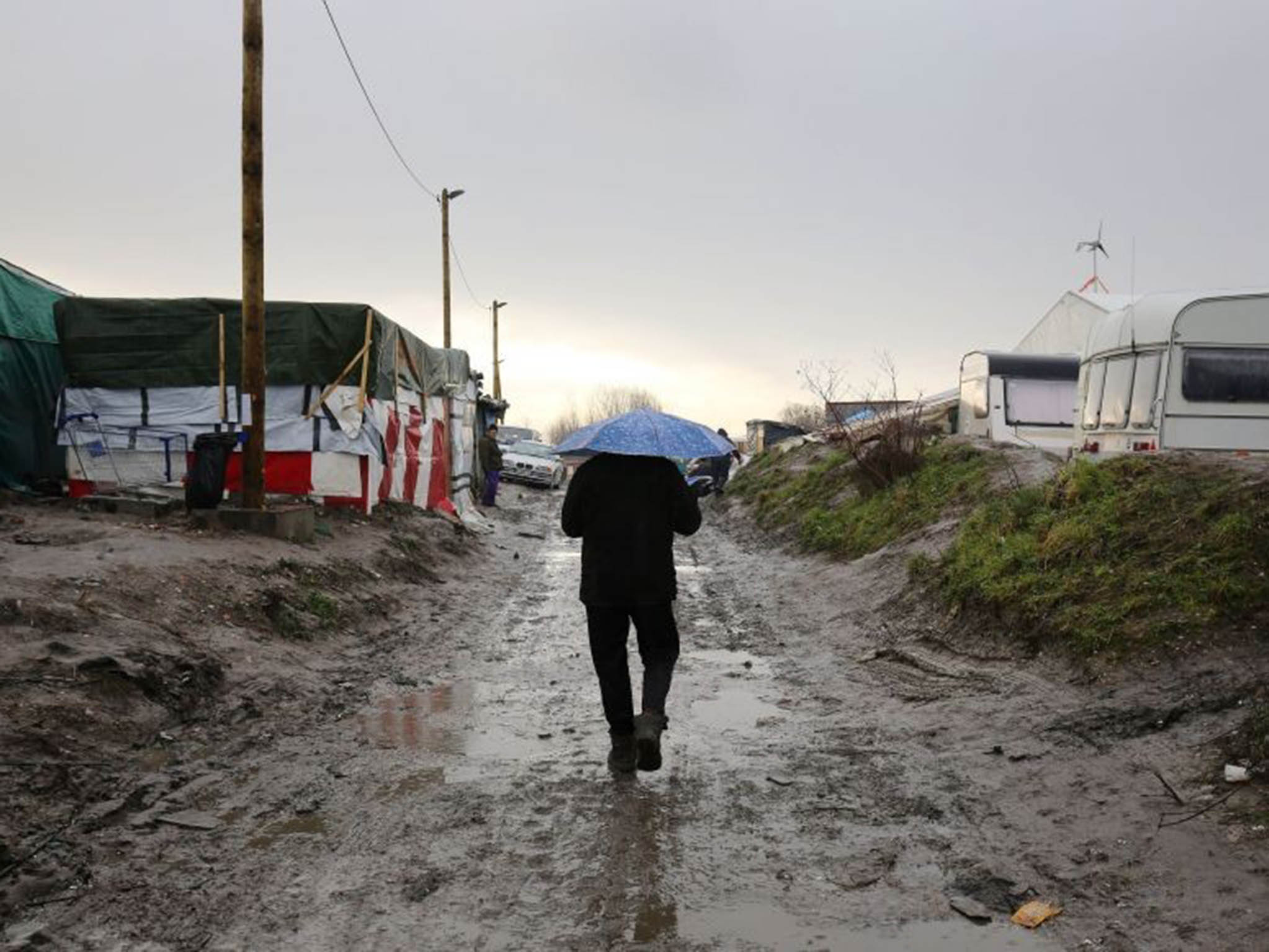 &#13;
One of their children has been living in a refugee camp in Calais for five months &#13;