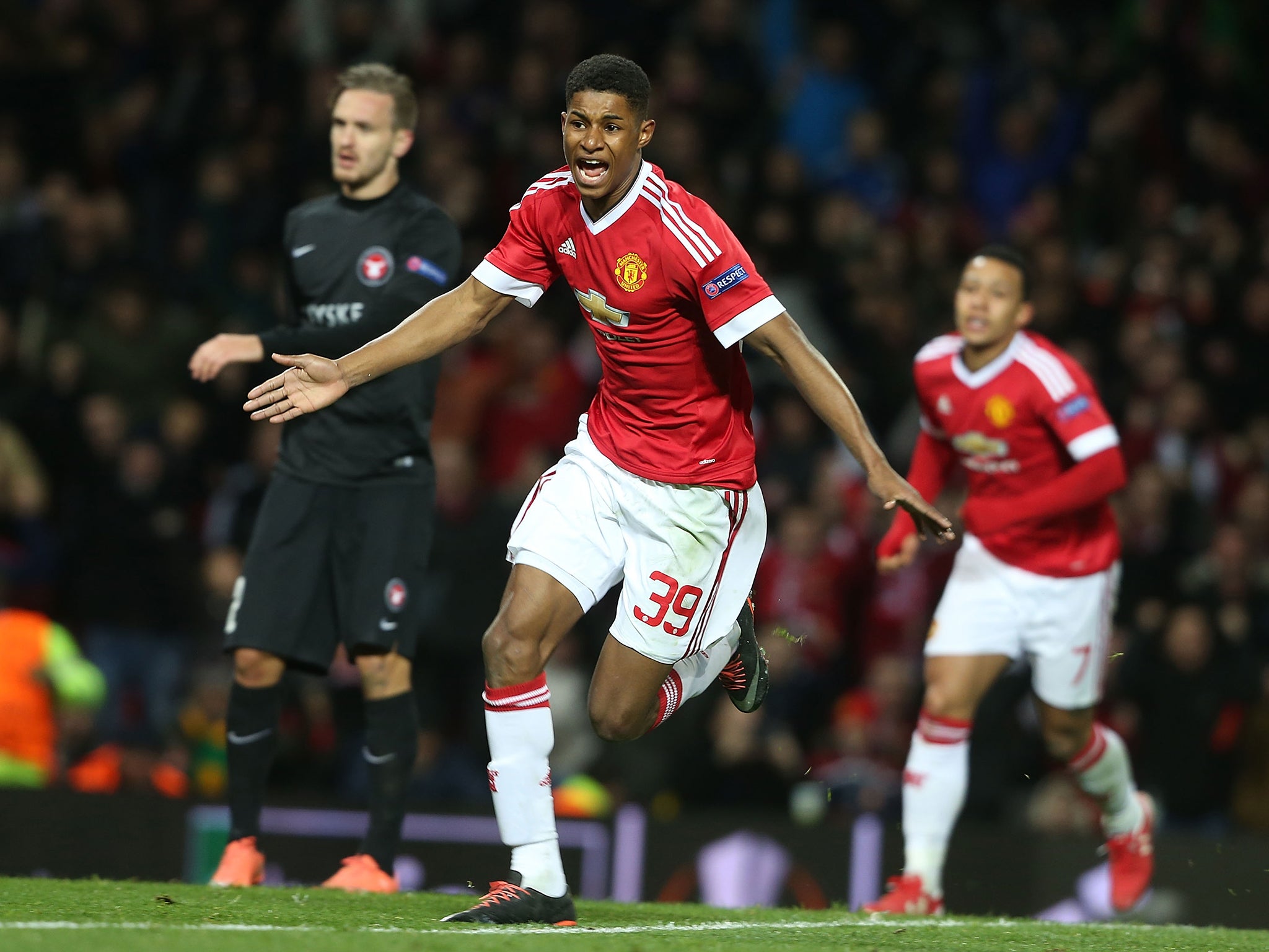 Marcus Rashford celebrates his first goal of the game