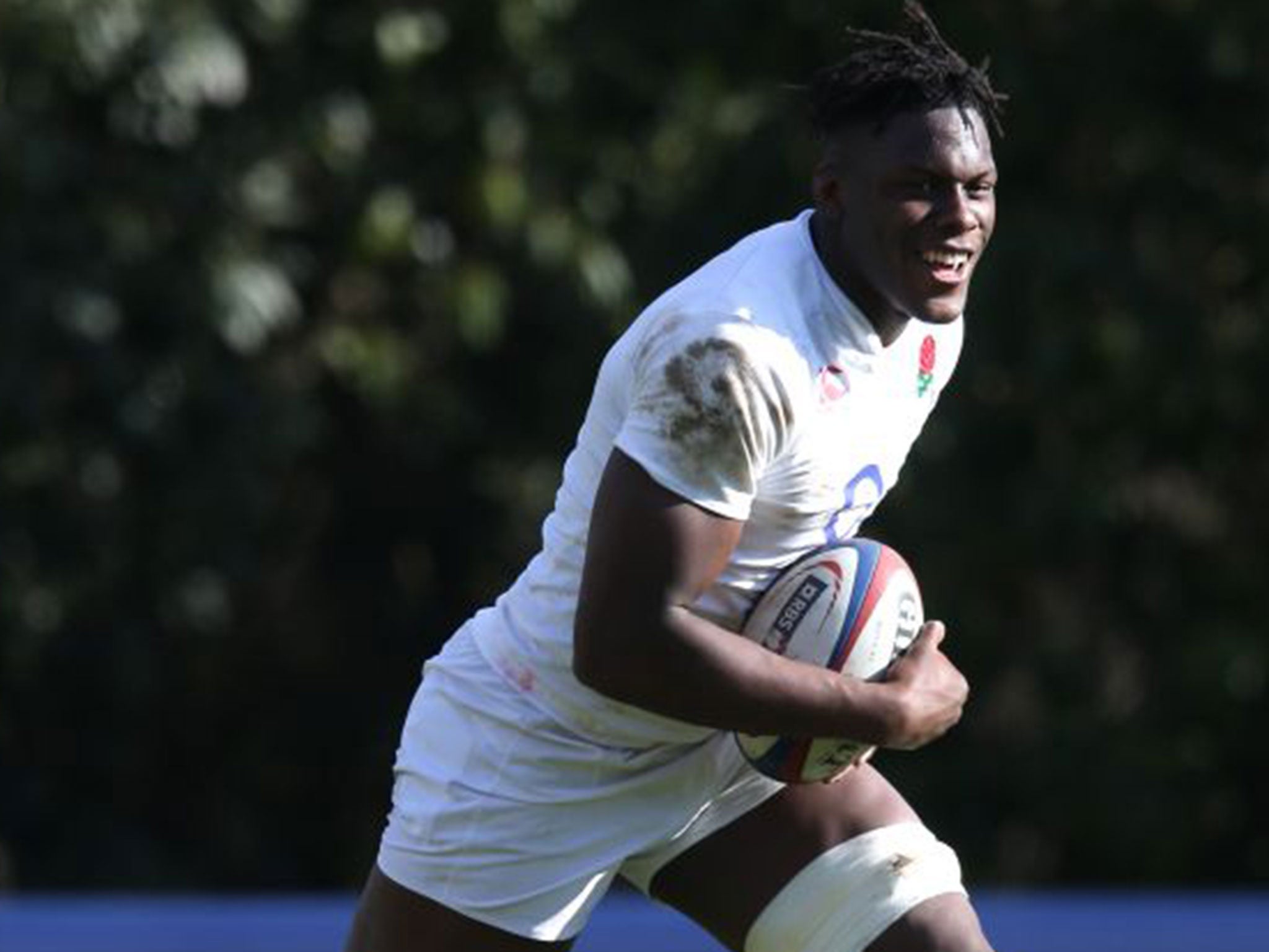 Maro Itoje enjoys himself during training with England