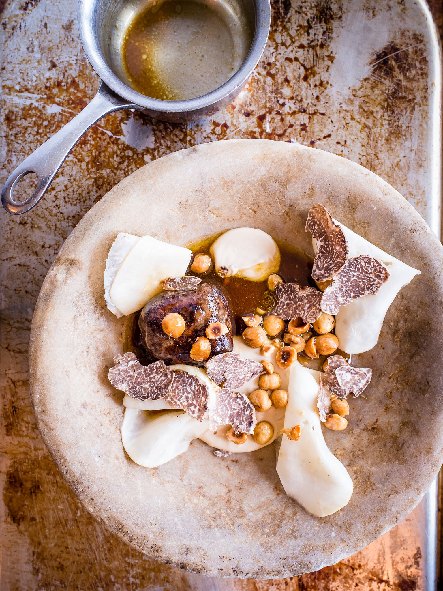 Game faggots with celeriac pickle and purée and toasted hazelnuts