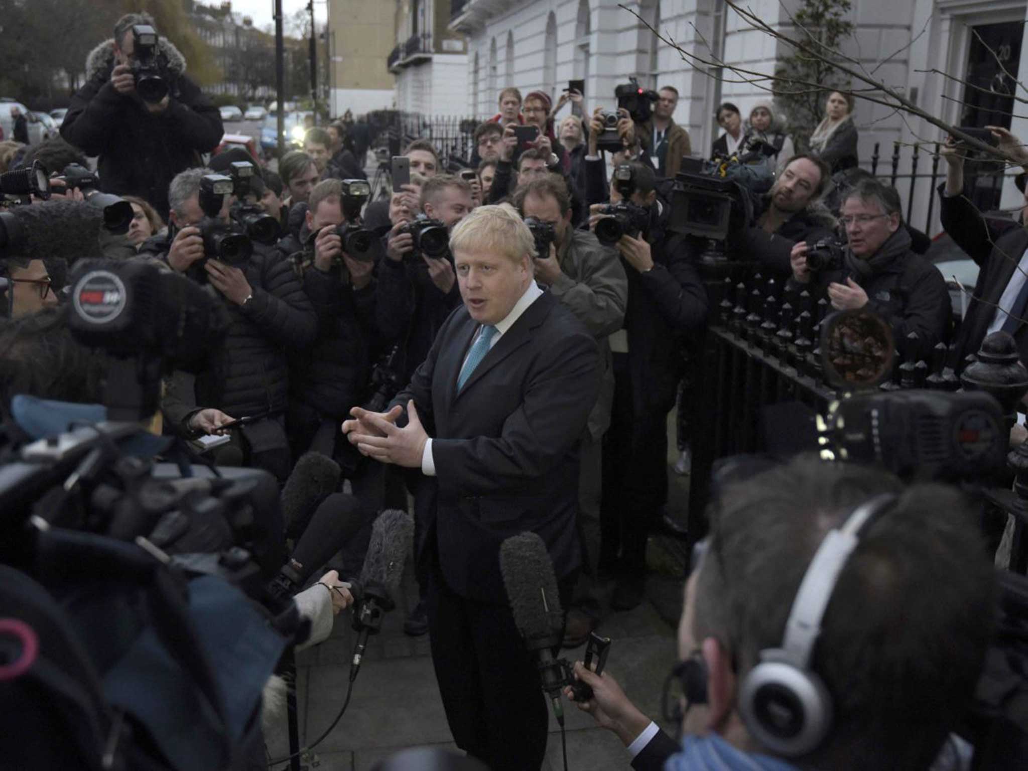 London Mayor Boris Johnson speaks to the media in front of his home in London