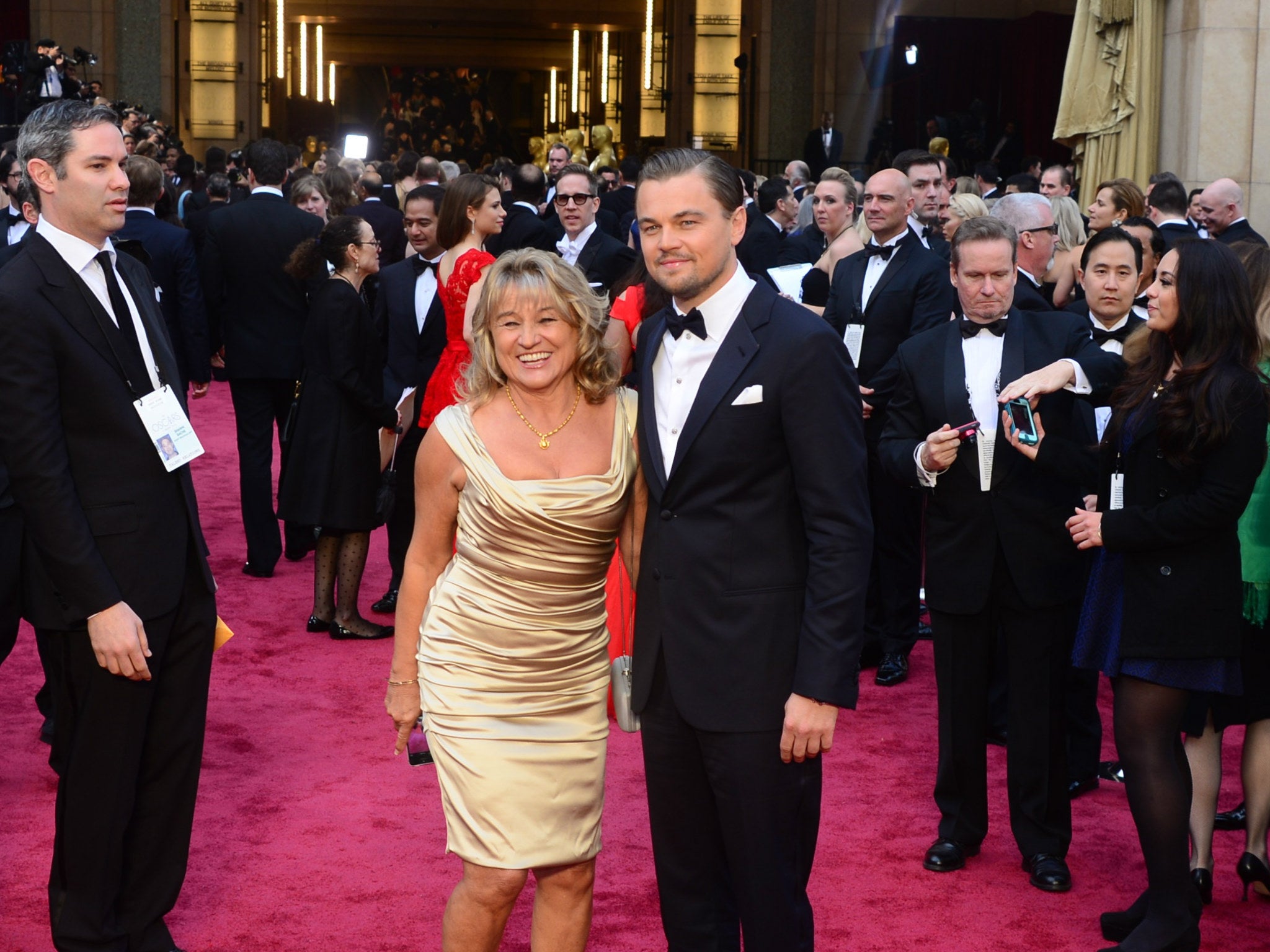 Leonardo DiCaprio arrives with his mother Irmelin for the 86th Academy Awards on March 2nd, 2014 in Hollywood, California