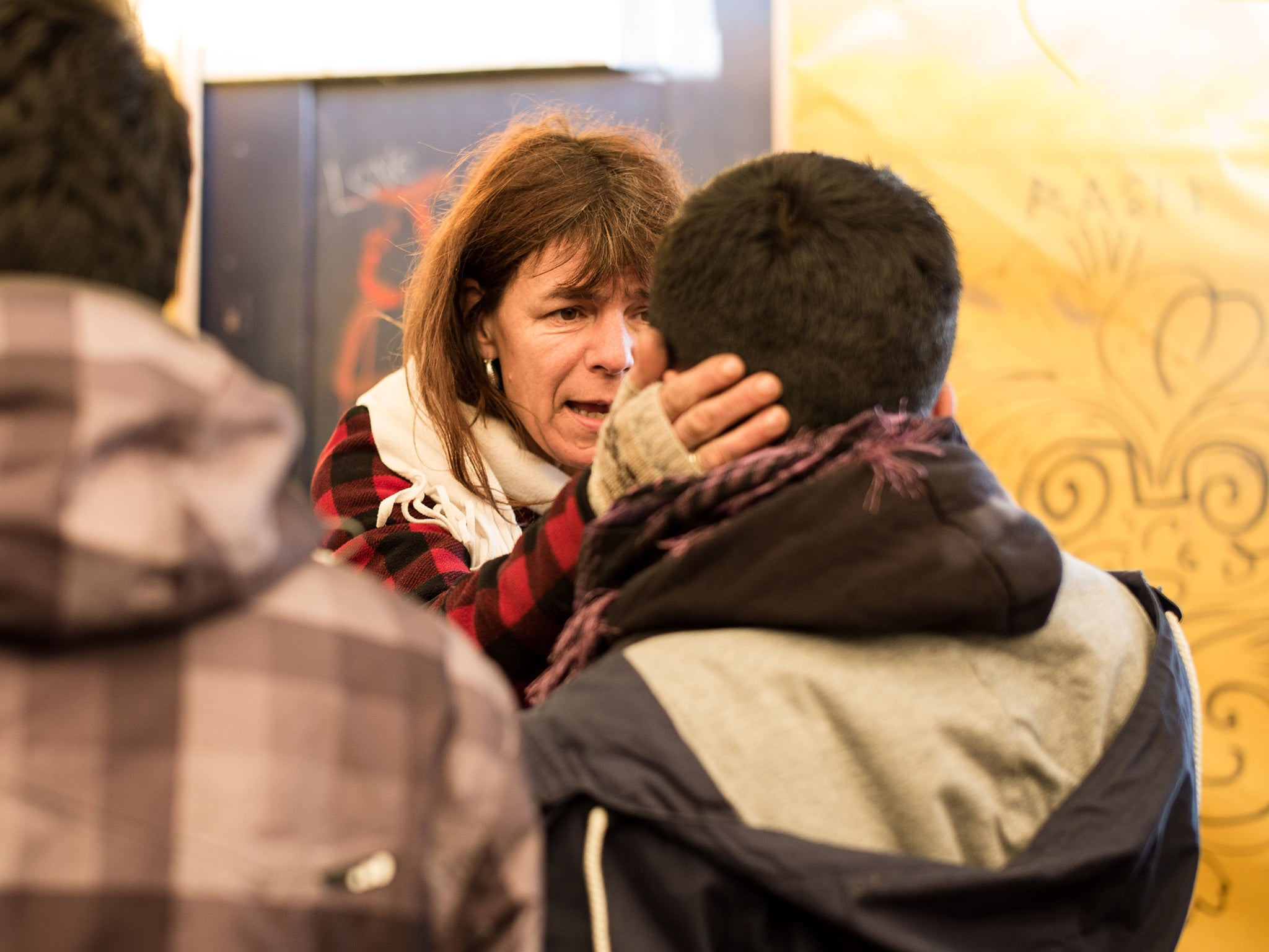 Liz Clegg with one of the 450 or so children in the ‘Jungle’ camp in Calais Charlie Forgham Bailey.