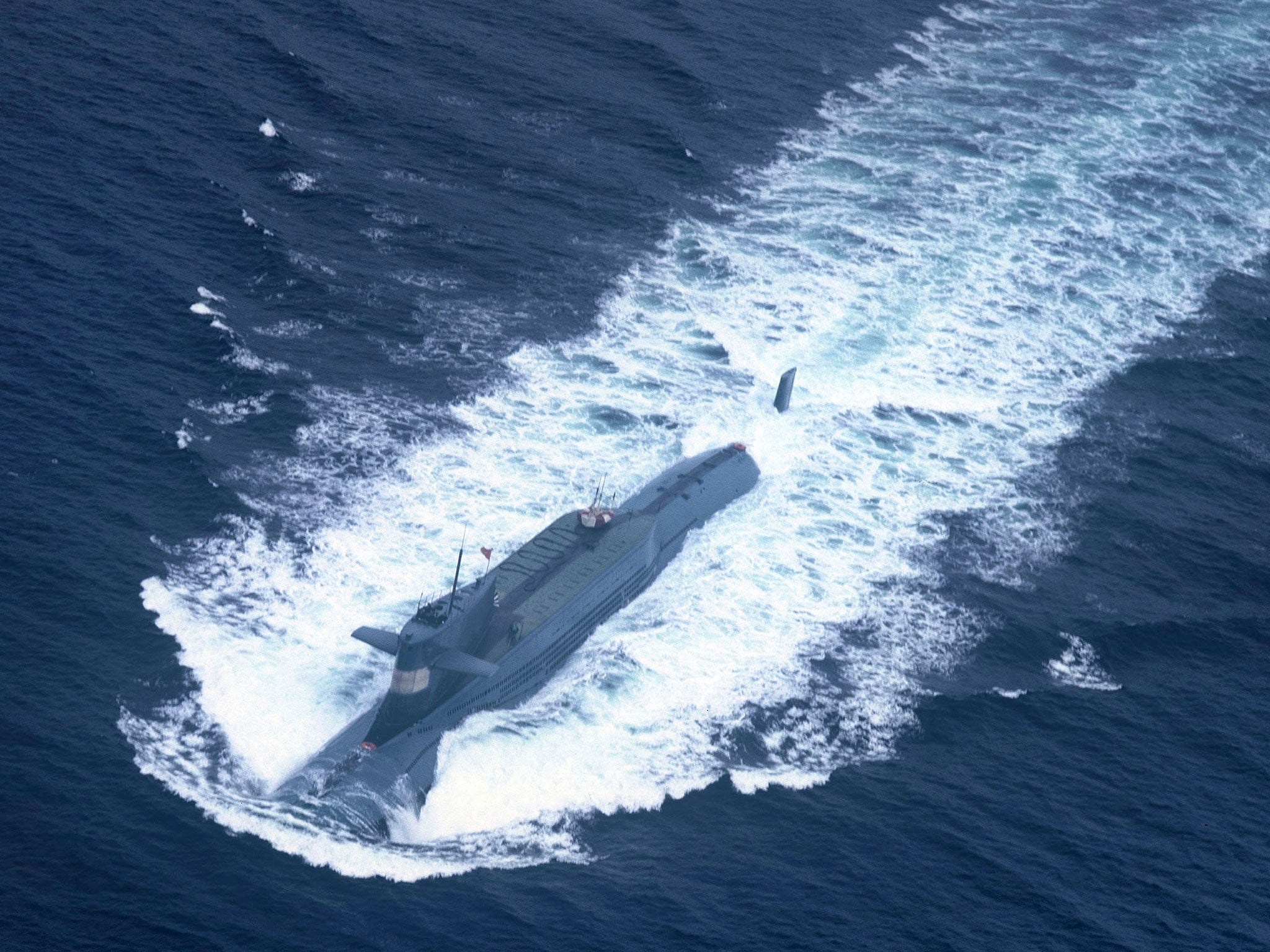 A nuclear-powered submarine of the Chinese People's Liberation Army Navy's North Sea Fleet preparing to dive at sea