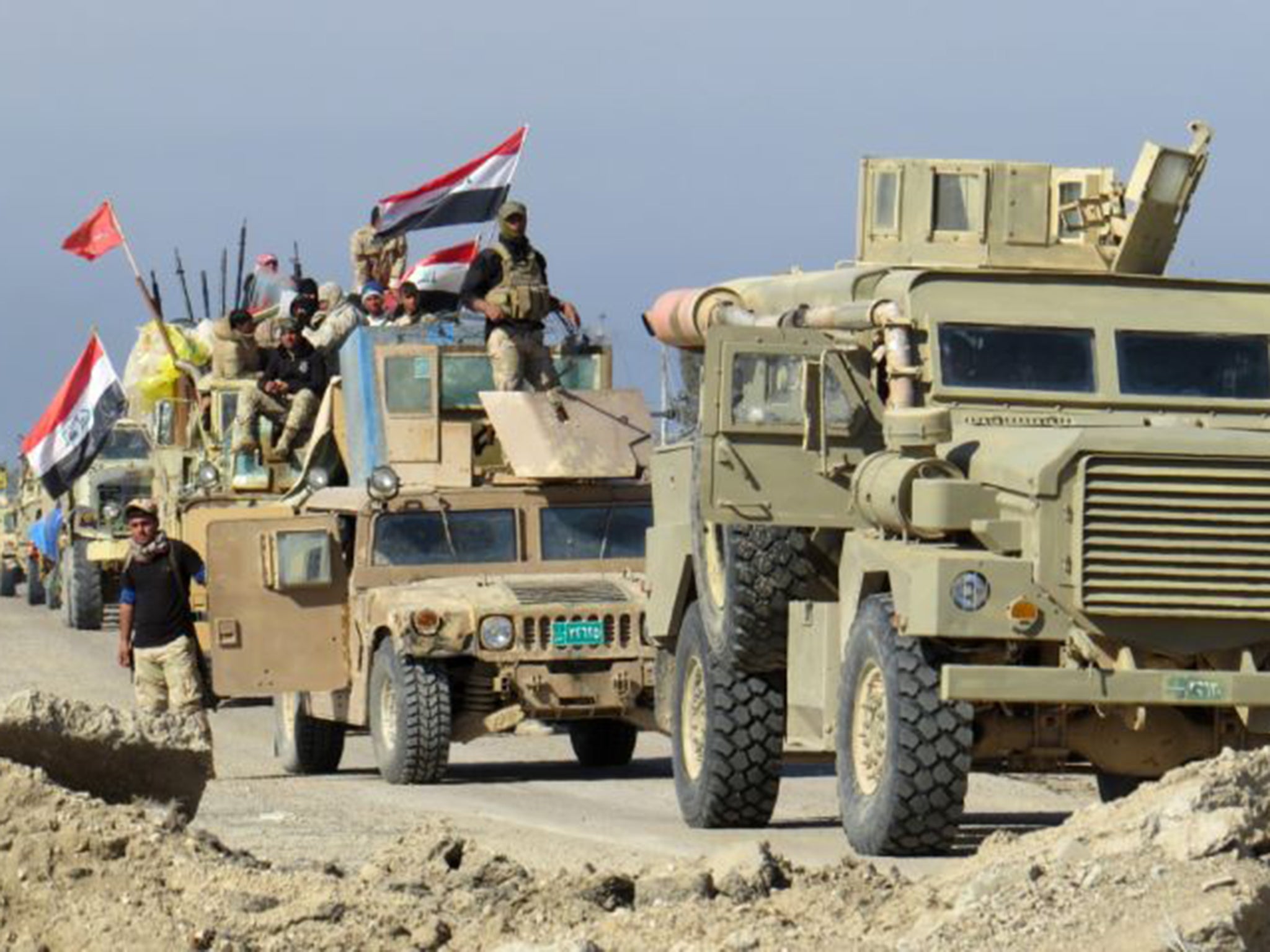 &#13;
Iraqi forces after retaking Ramadi earlier this month &#13;