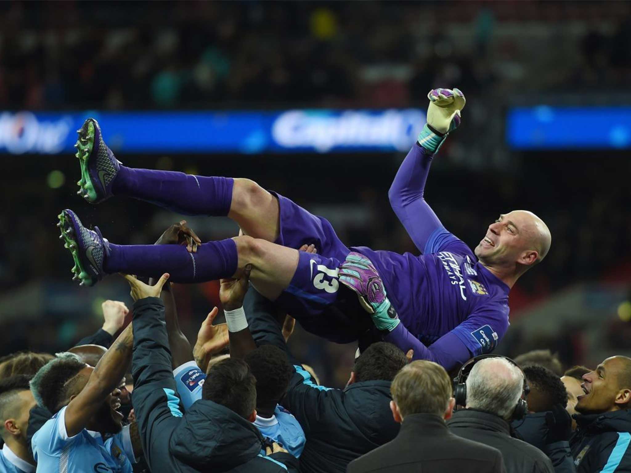 &#13;
Goalkeeper Willy Caballero celebrates with his team-mates after the penalty shootout&#13;