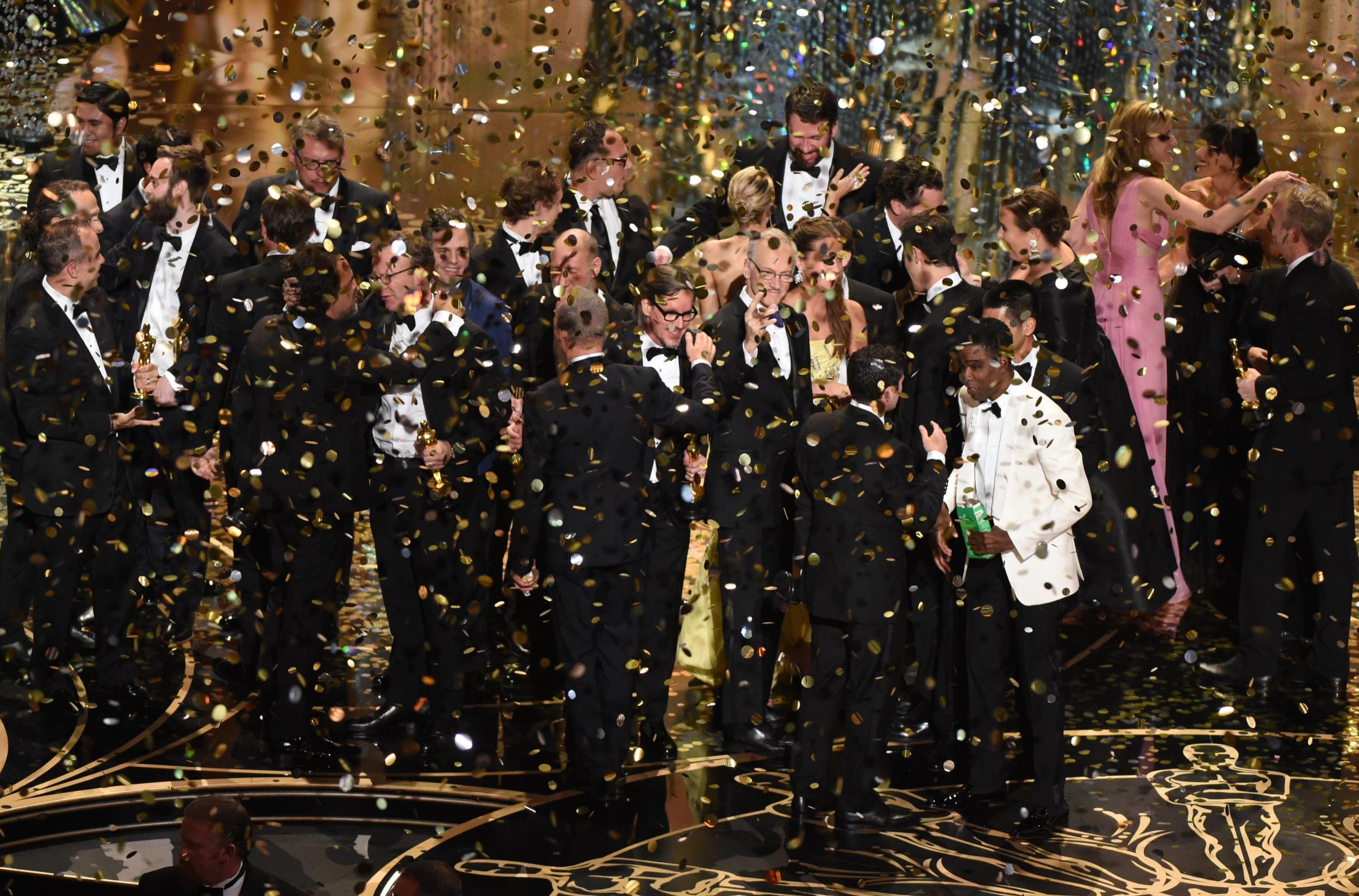 The Spotlight cast and crew celebrate their win