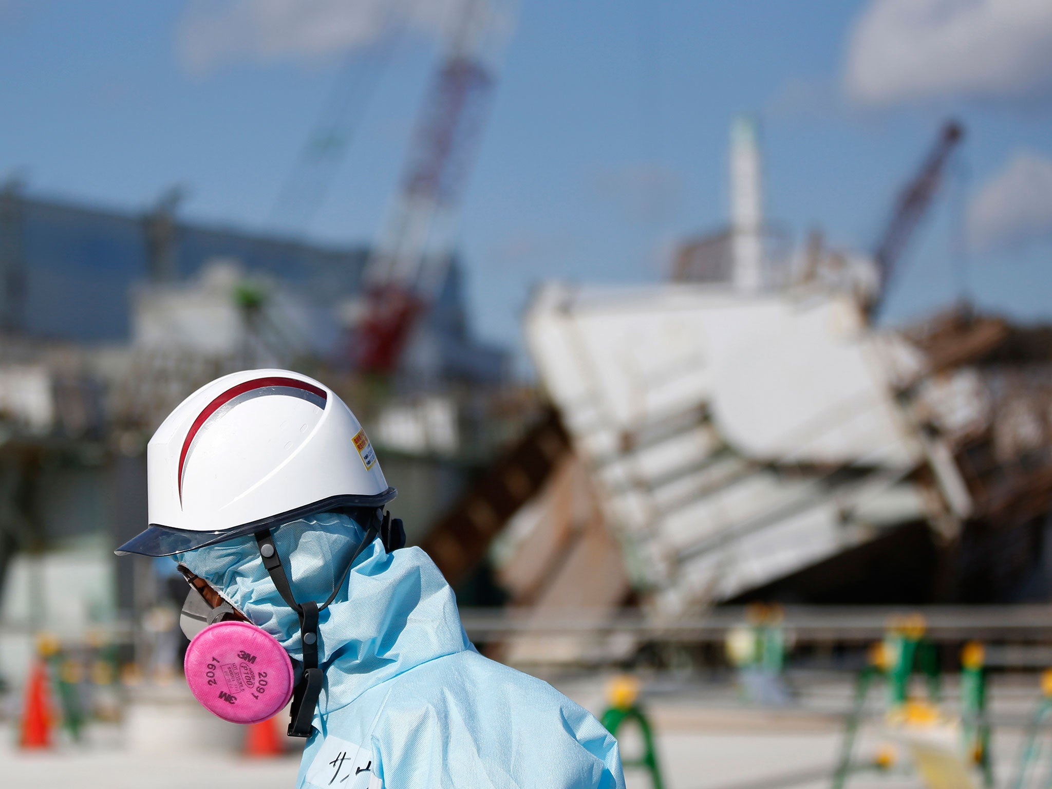 A Tokyo Electric Power Co. (TEPCO) employee tours the Fukushima nuclear power plant. Japan is preparing to mark the fifth anniversary of the disaster