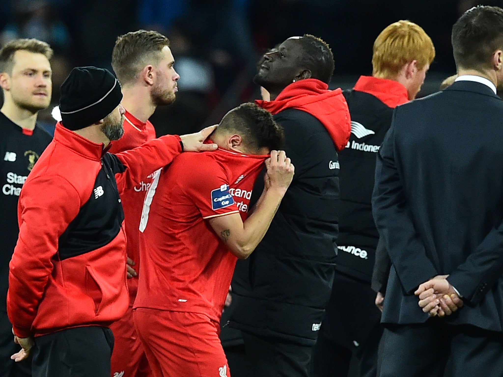 A distraught Philippe Coutinho reacts after his penalty miss