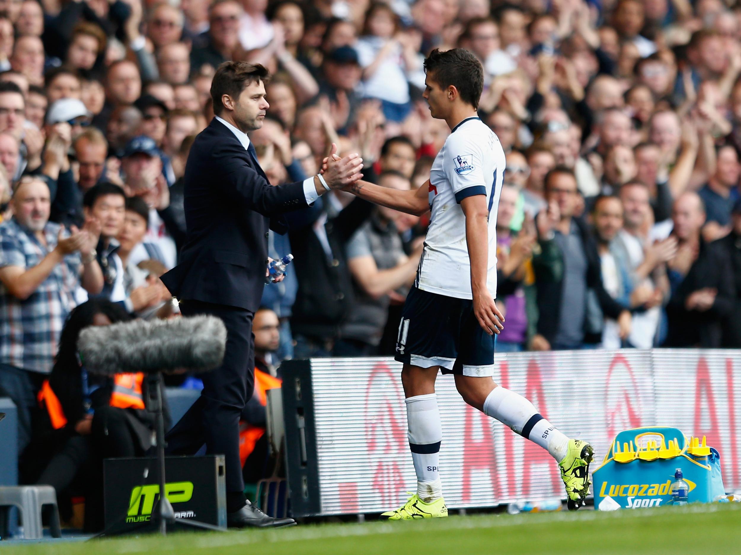 Erik Lamela and Mauricio Pochettino on the side-lines at White Hart Lane