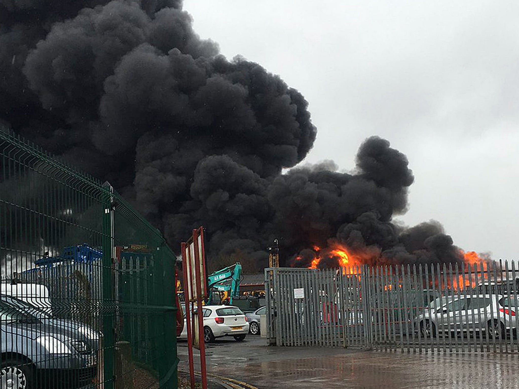 Photos showed flames shooting from the building's roof