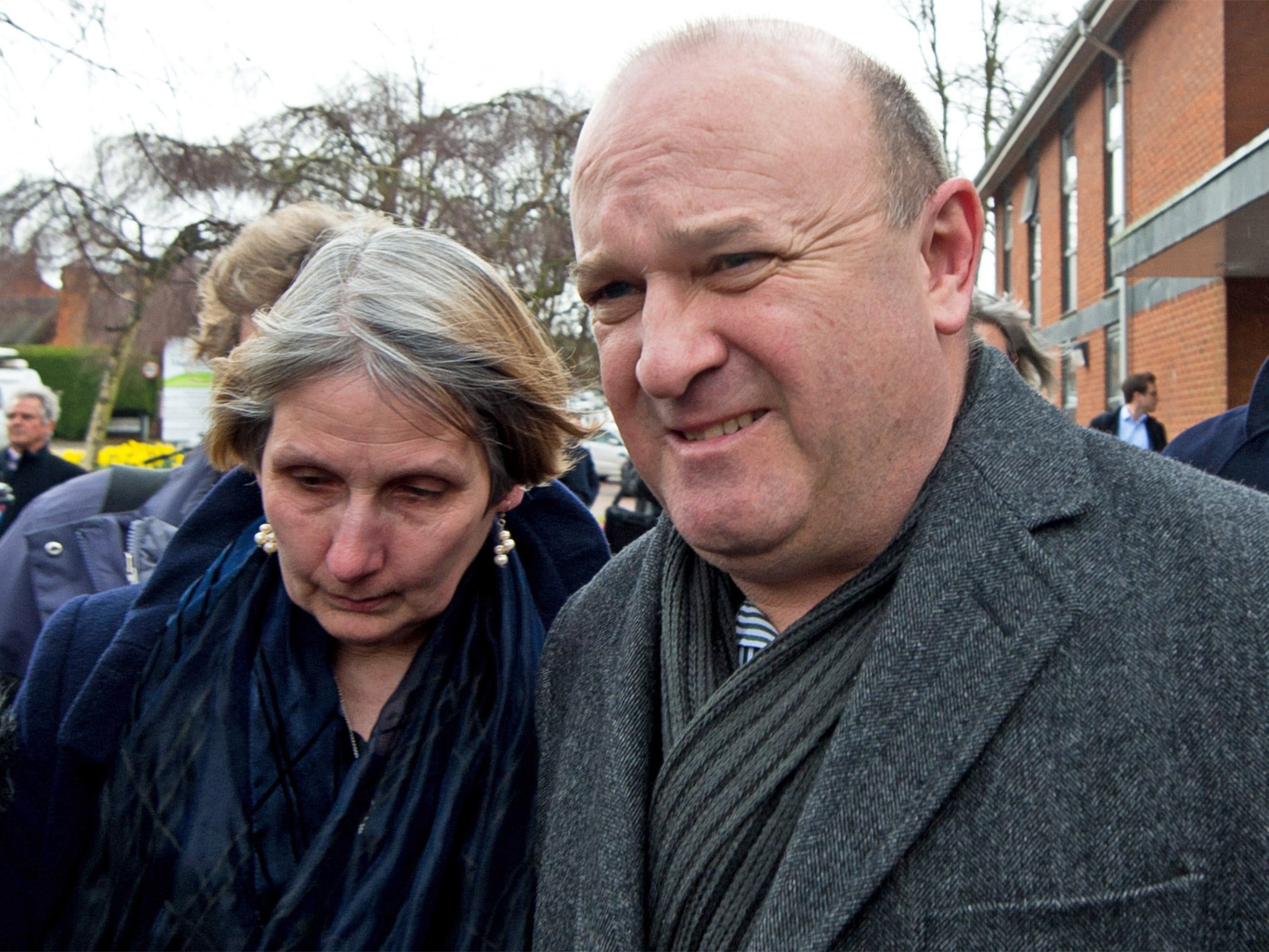 The parents of Elliott Johnson, Alison and Ray, leaving the court