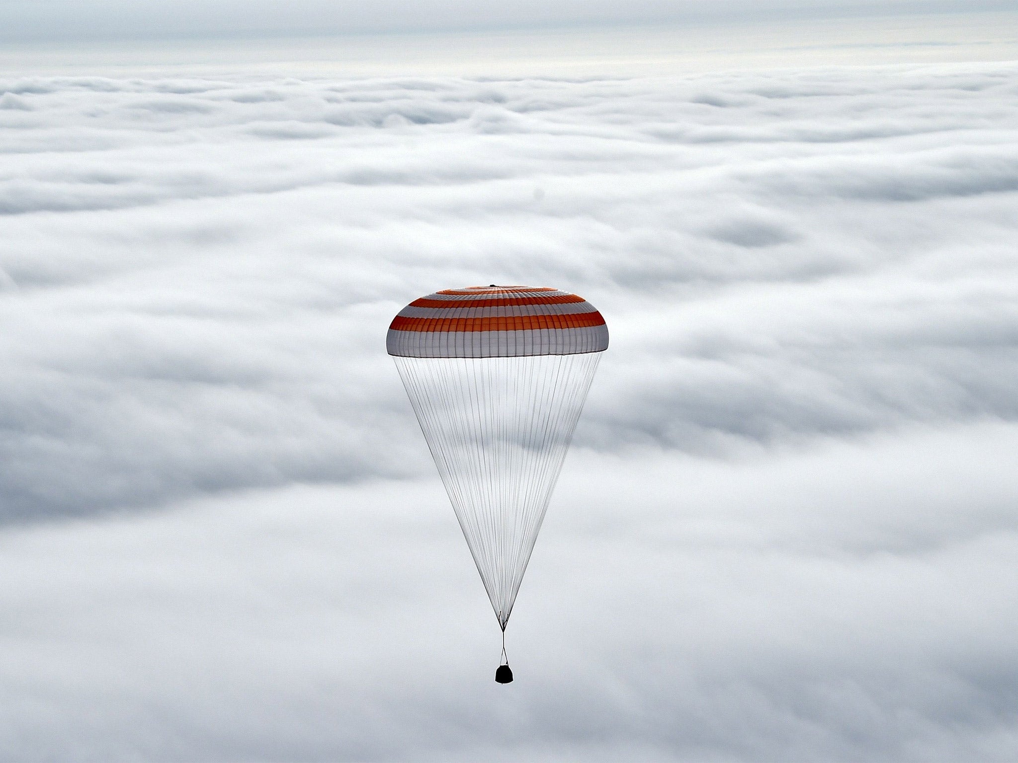 &#13;
The Soyuz space capsule on its way to landing in a remote area in Kazakhstan (Getty)&#13;